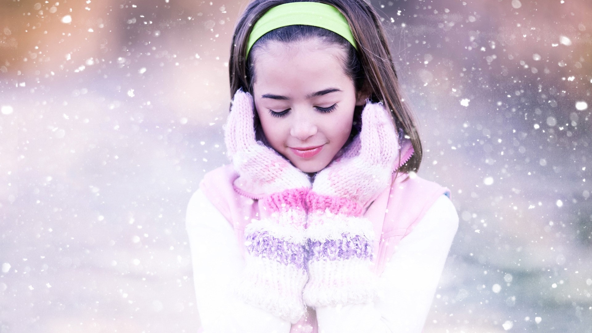 Girl in mittens with falling snow HD Wallpaper