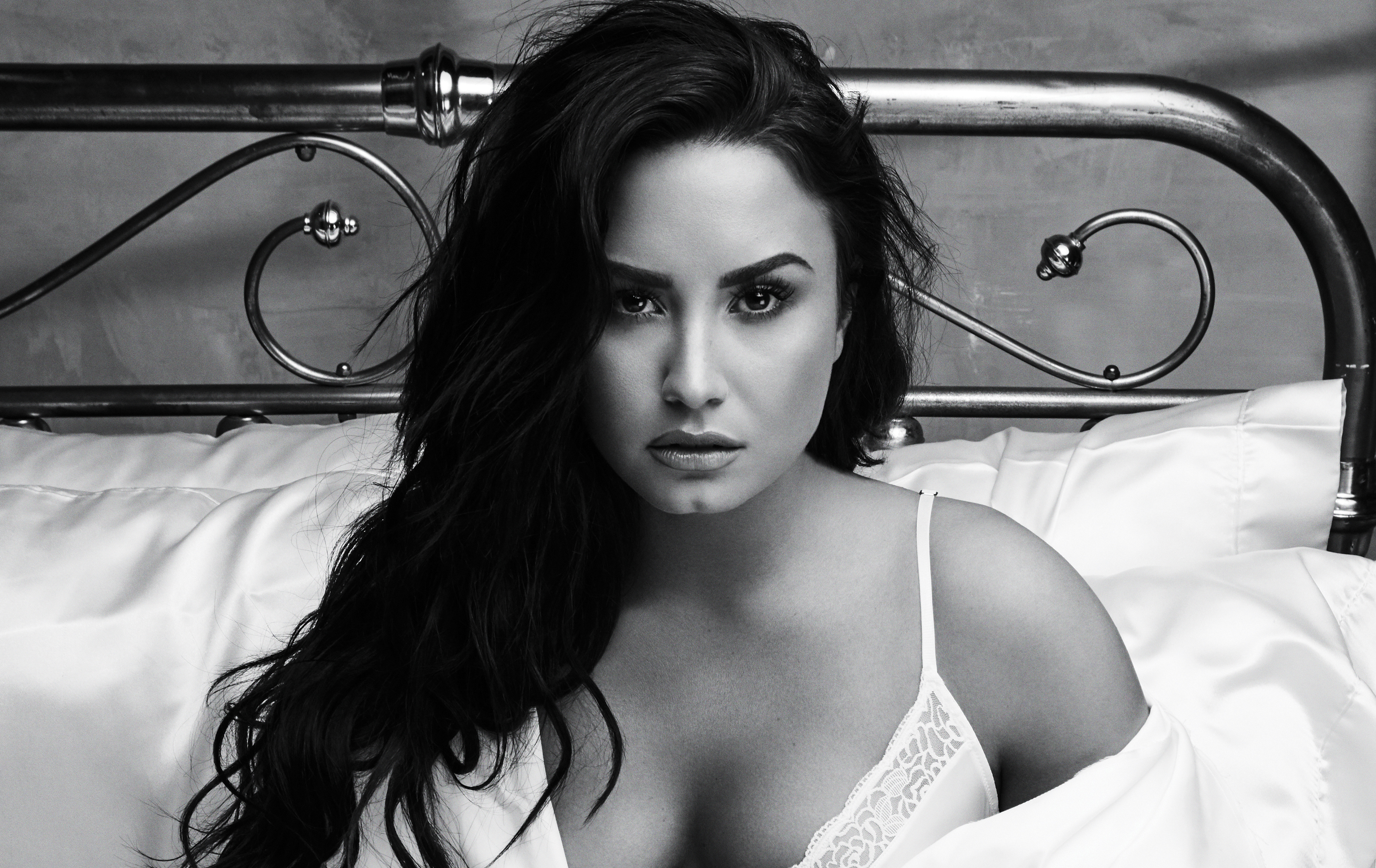 Demi Lovato in bed HD Wallpaper