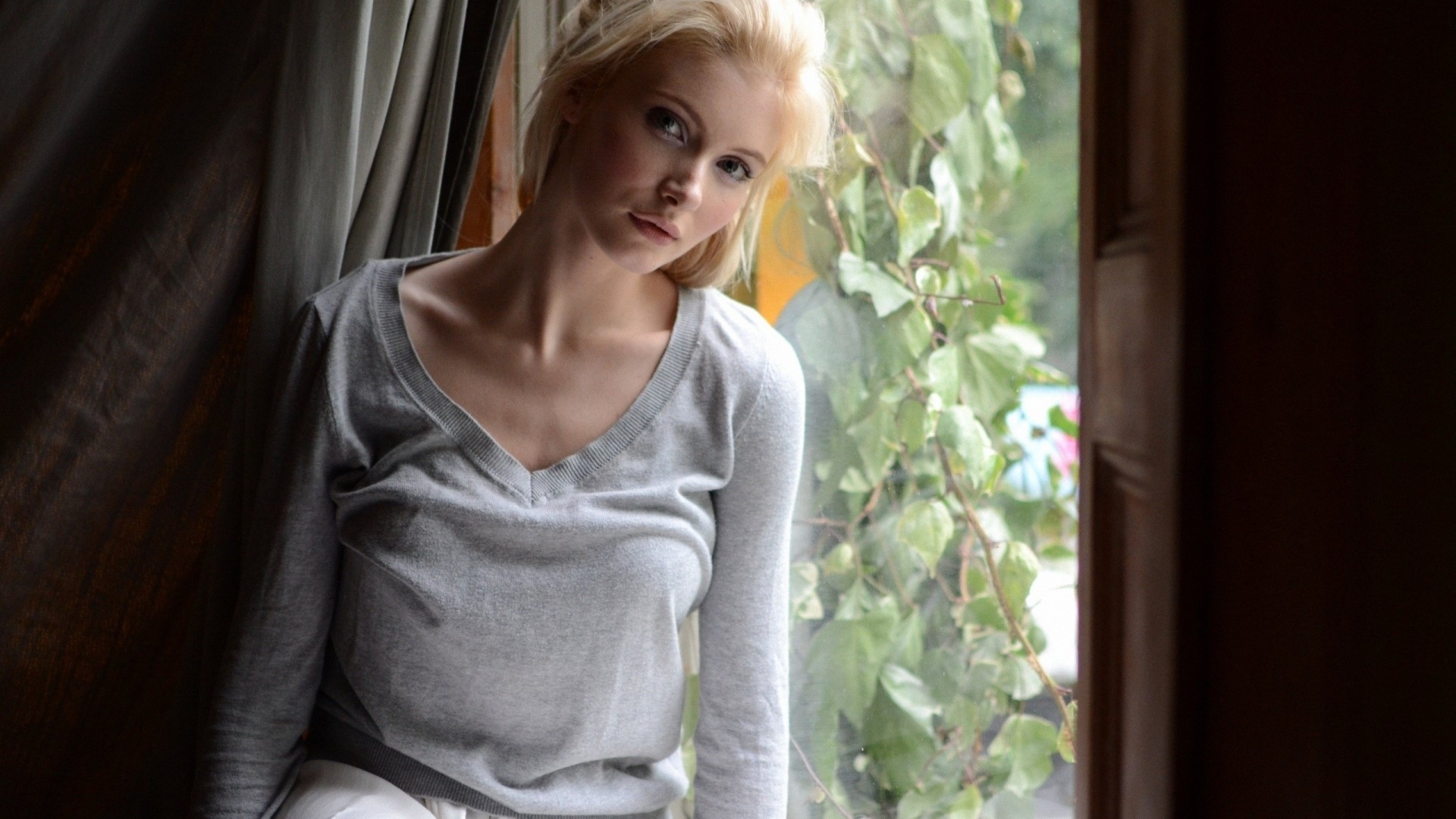Blonde woman by the window HD Wallpaper
