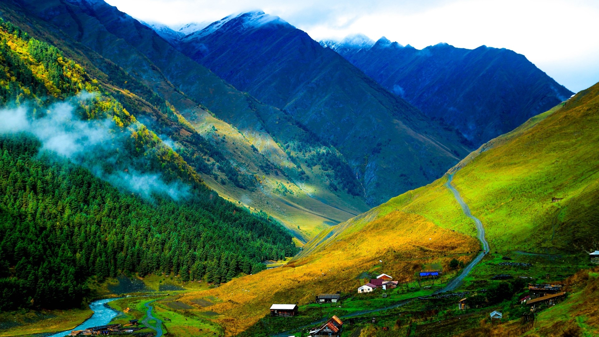 Blue mountains with green valley and river HD Wallpaper