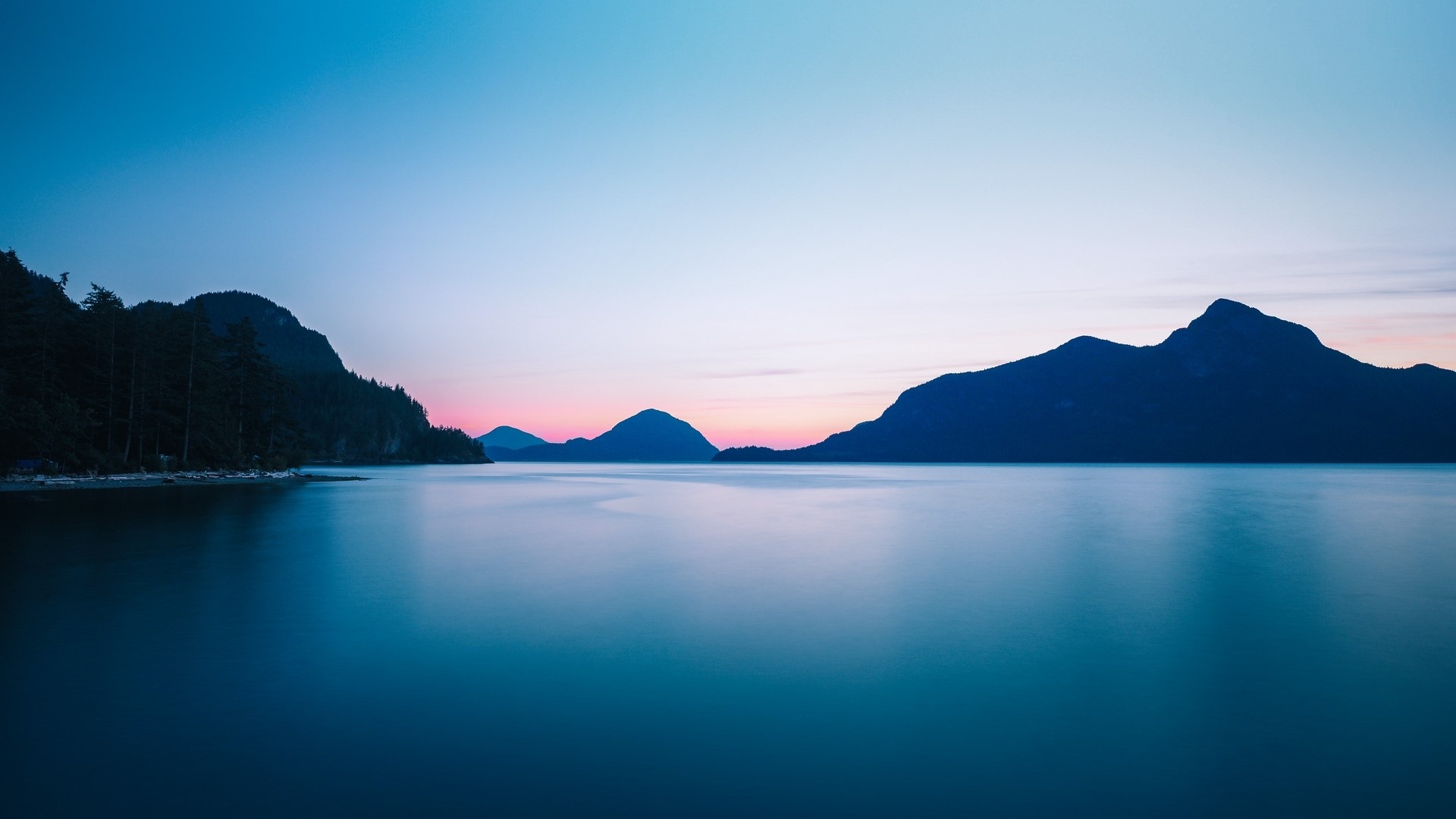 Calm lake and mountains at dusk HD Wallpaper