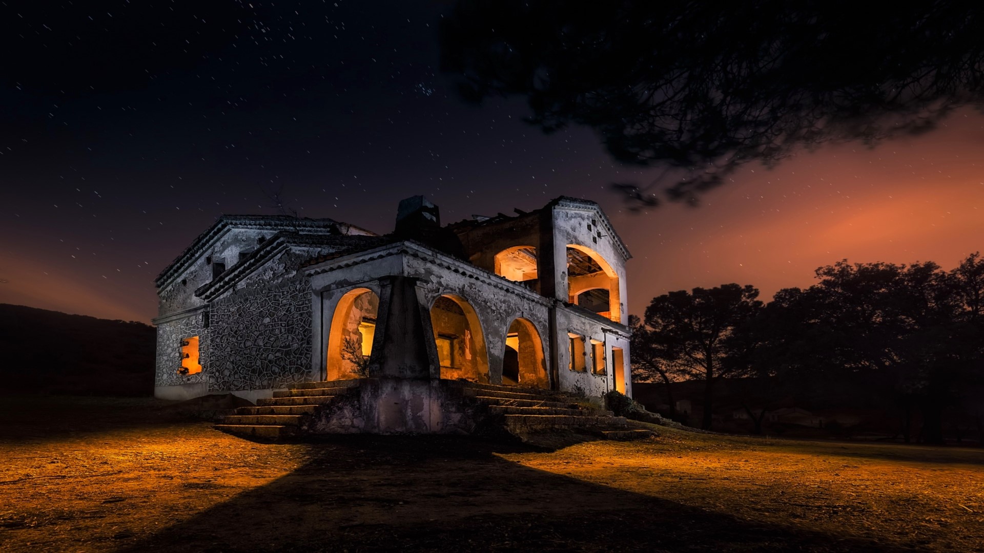 An old abandoned house at night under the stars HD Wallpaper