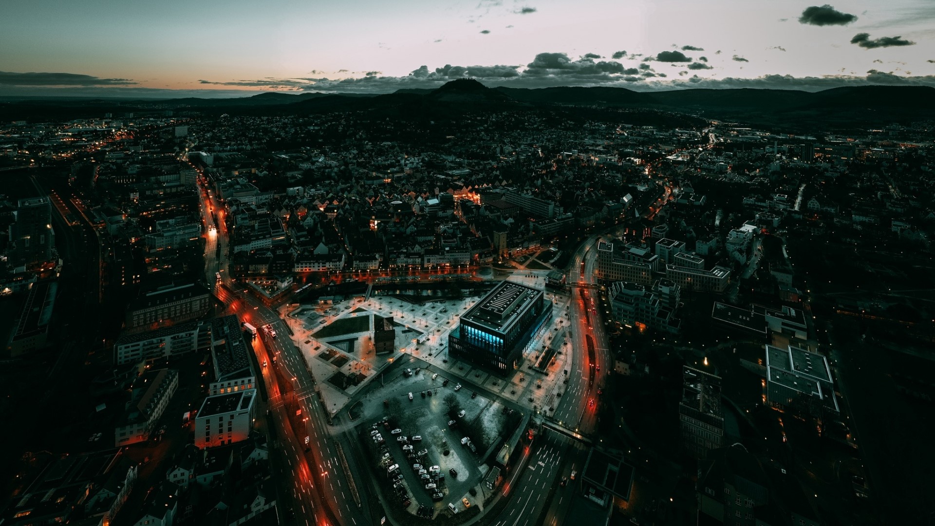 Aerial view of a city at dusk in Baden-Württemberg, Germany HD Wallpaper