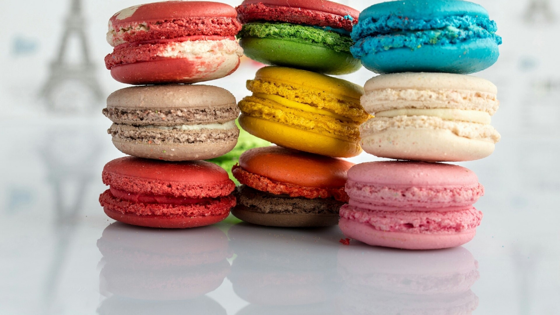 Colorful Macarons stacked in piles HD Wallpaper