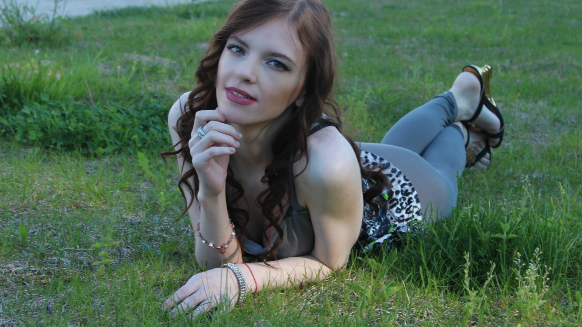 Woman lying on grass HD Wallpaper