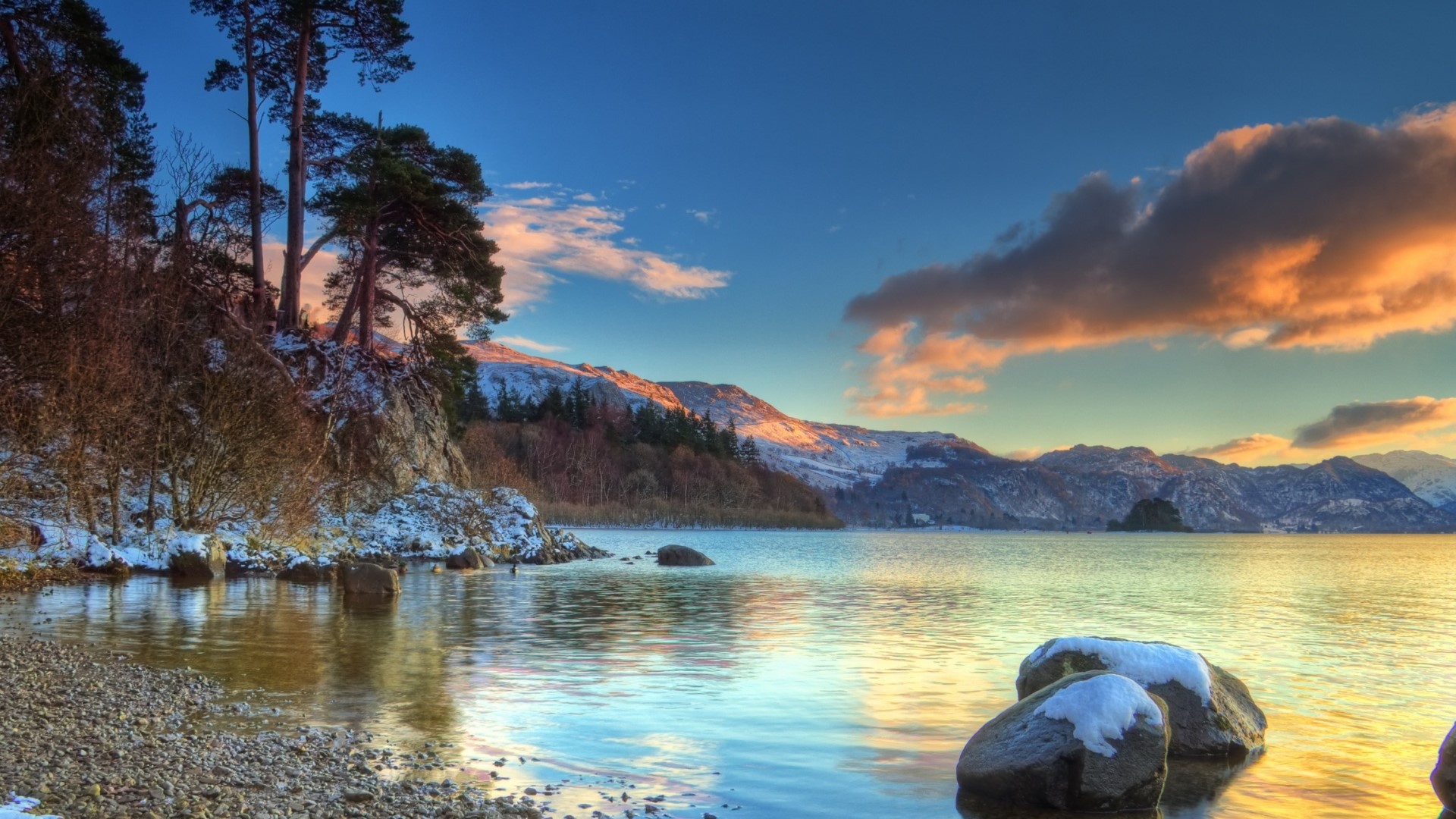 Winter landscape with snow-covered mountains and lake HD Wallpaper
