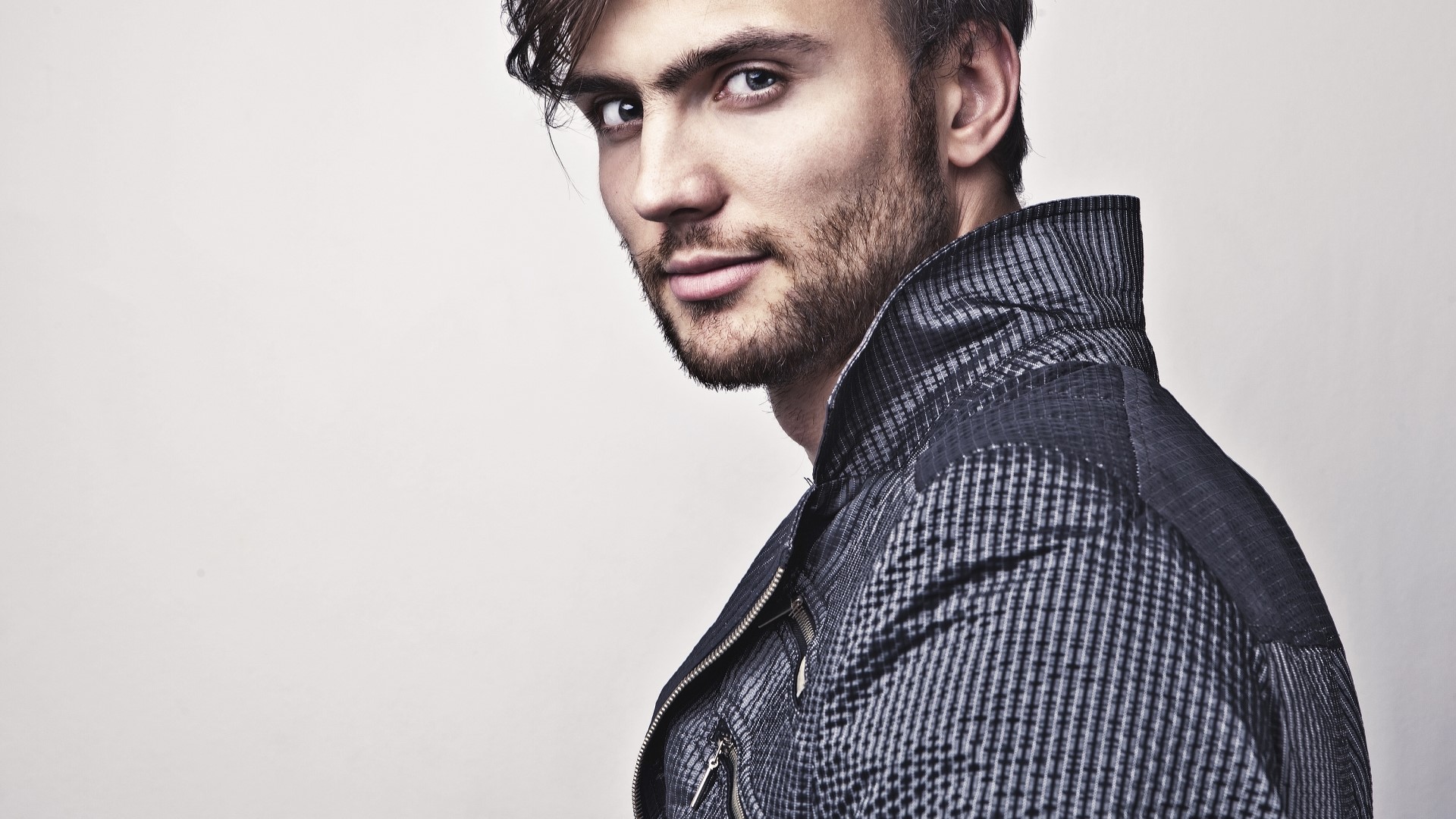 Man in a patterned jacket HD Wallpaper