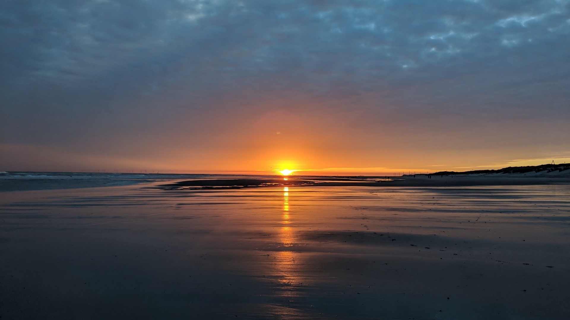 Sunset over a wet beach with clouds HD Wallpaper