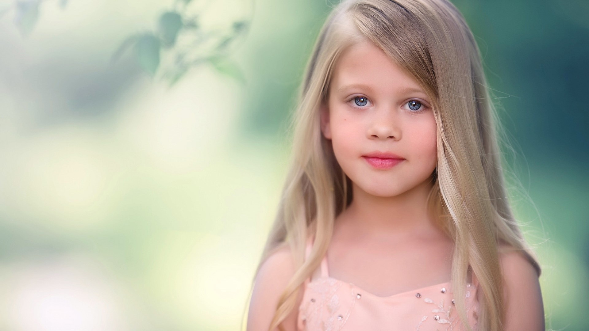 Young girl with blonde hair and blue eyes HD Wallpaper