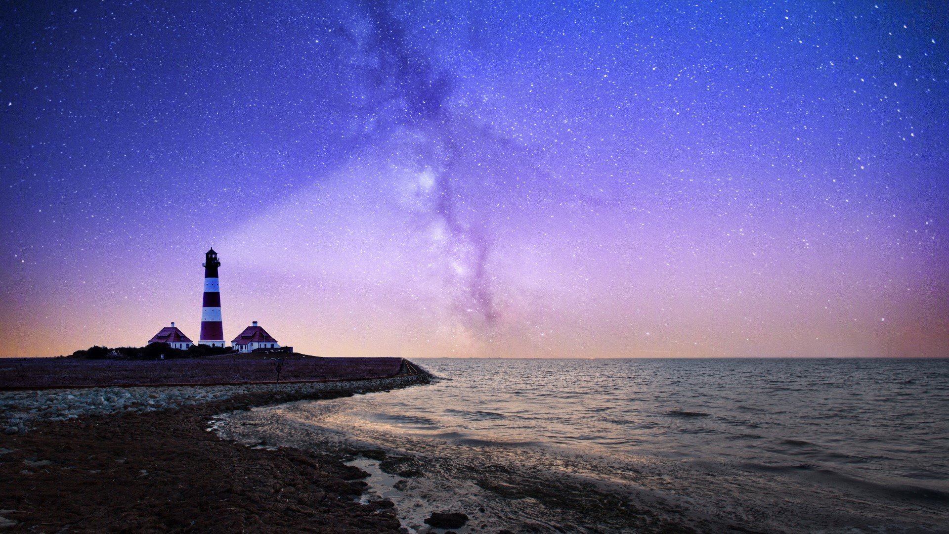 Lighthouse on the coast under the Milky Way HD Wallpaper