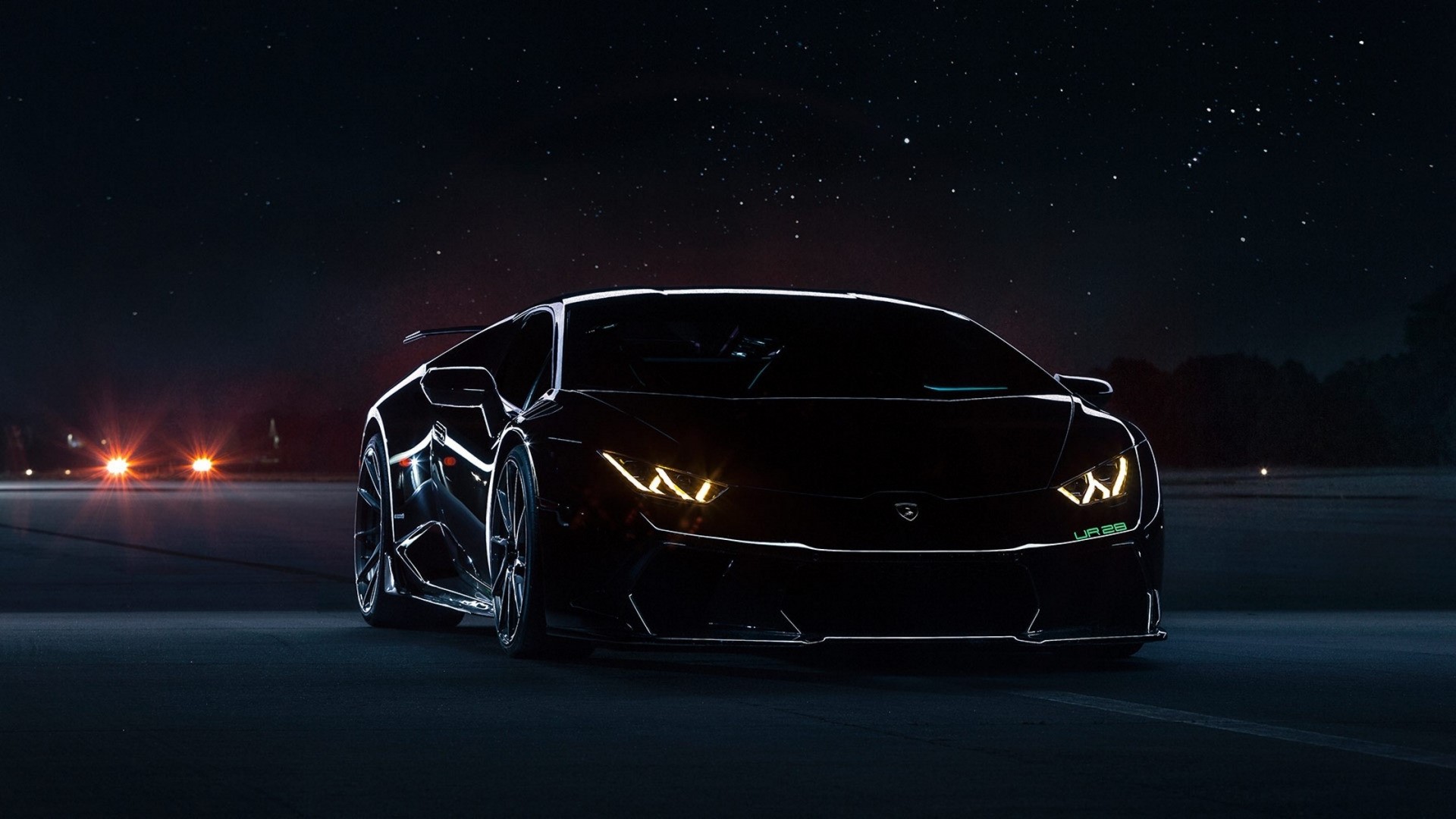 Black Lamborghini Huracan on a dark road at night HD Wallpaper