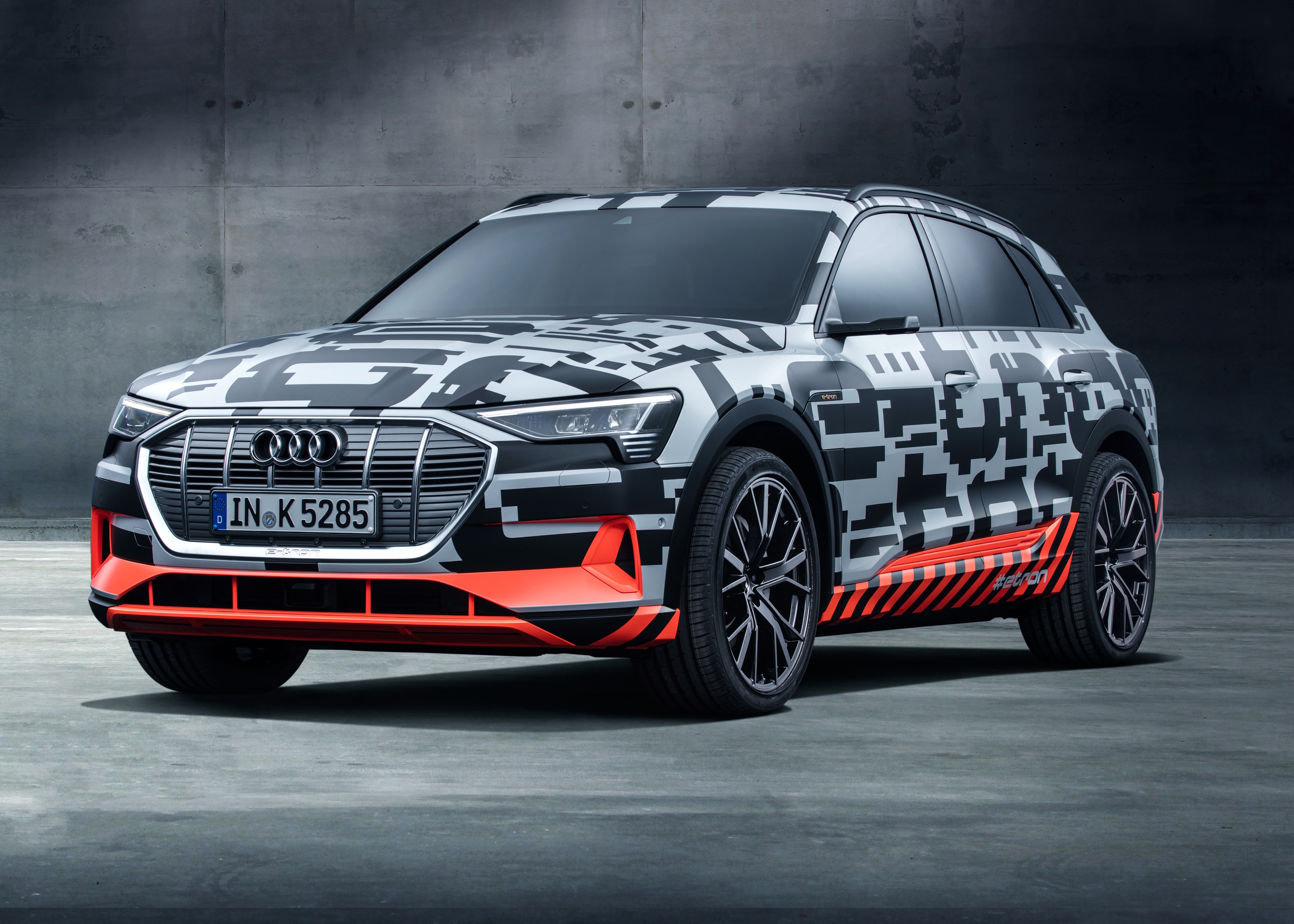 Audi e-Tron Prototype car with camouflage wrap HD Wallpaper