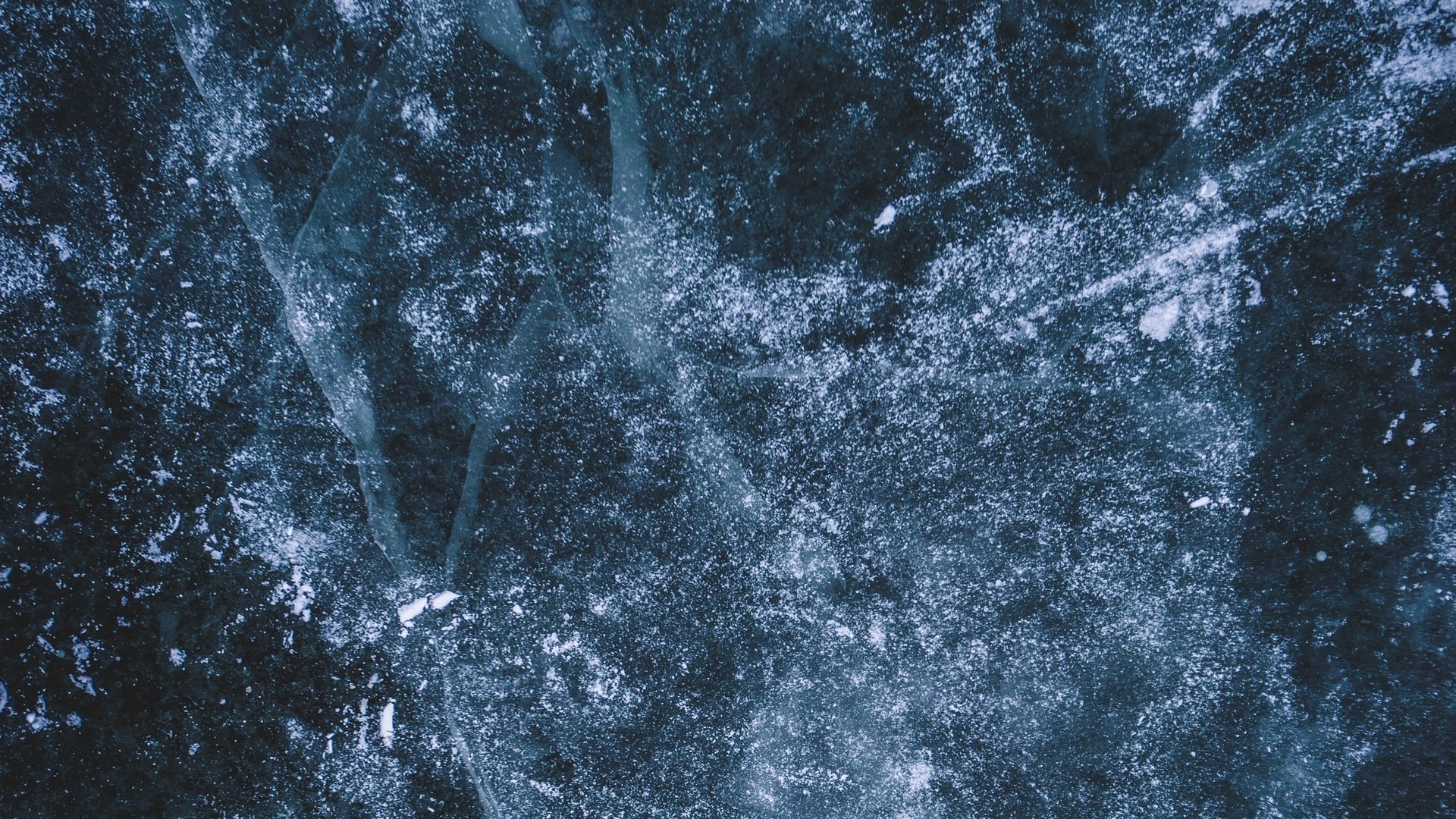 Close-up of cracked ice surface HD Wallpaper