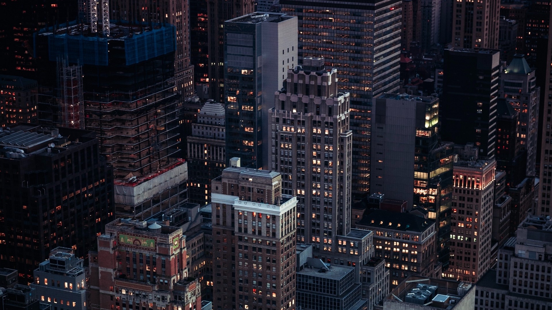 Night city skyline with illuminated skyscrapers HD Wallpaper