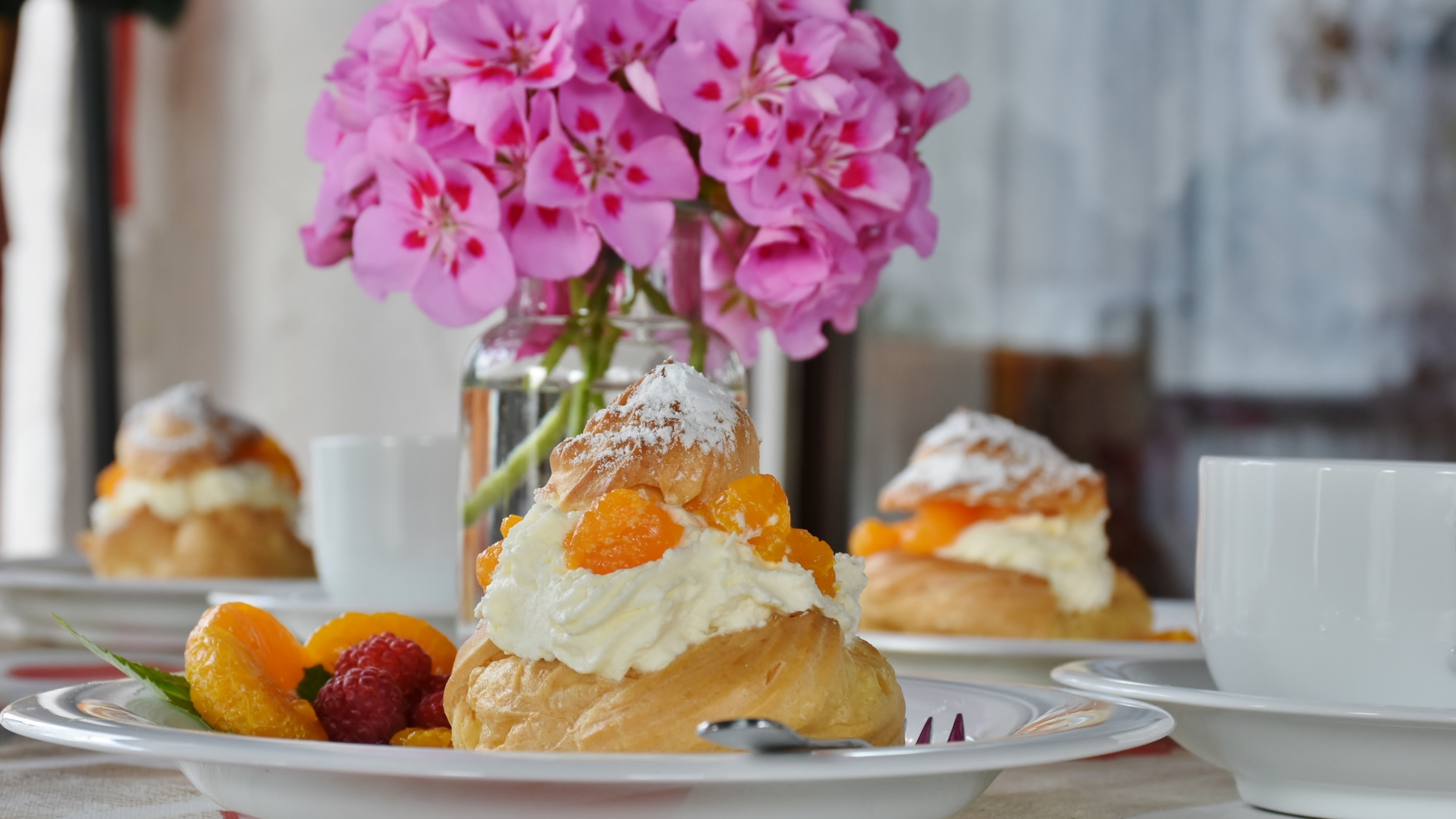 Cream puffs with fruit and flowers HD Wallpaper
