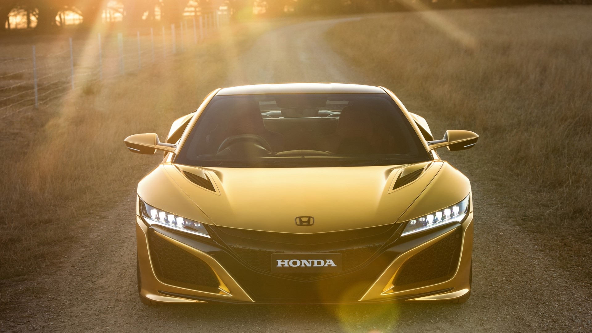 Gold Honda NSX on a dirt road at sunset HD Wallpaper