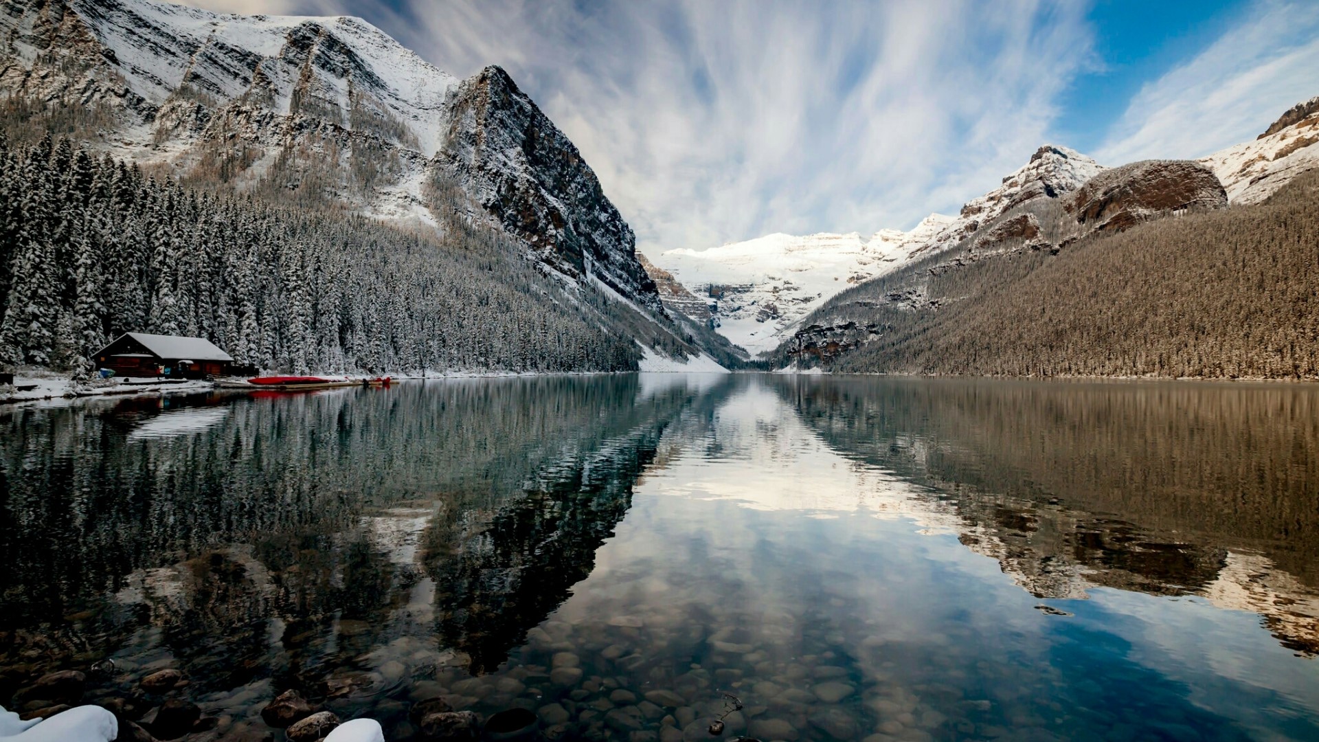 Winter landscape with snow-covered mountains and a lake HD Wallpaper