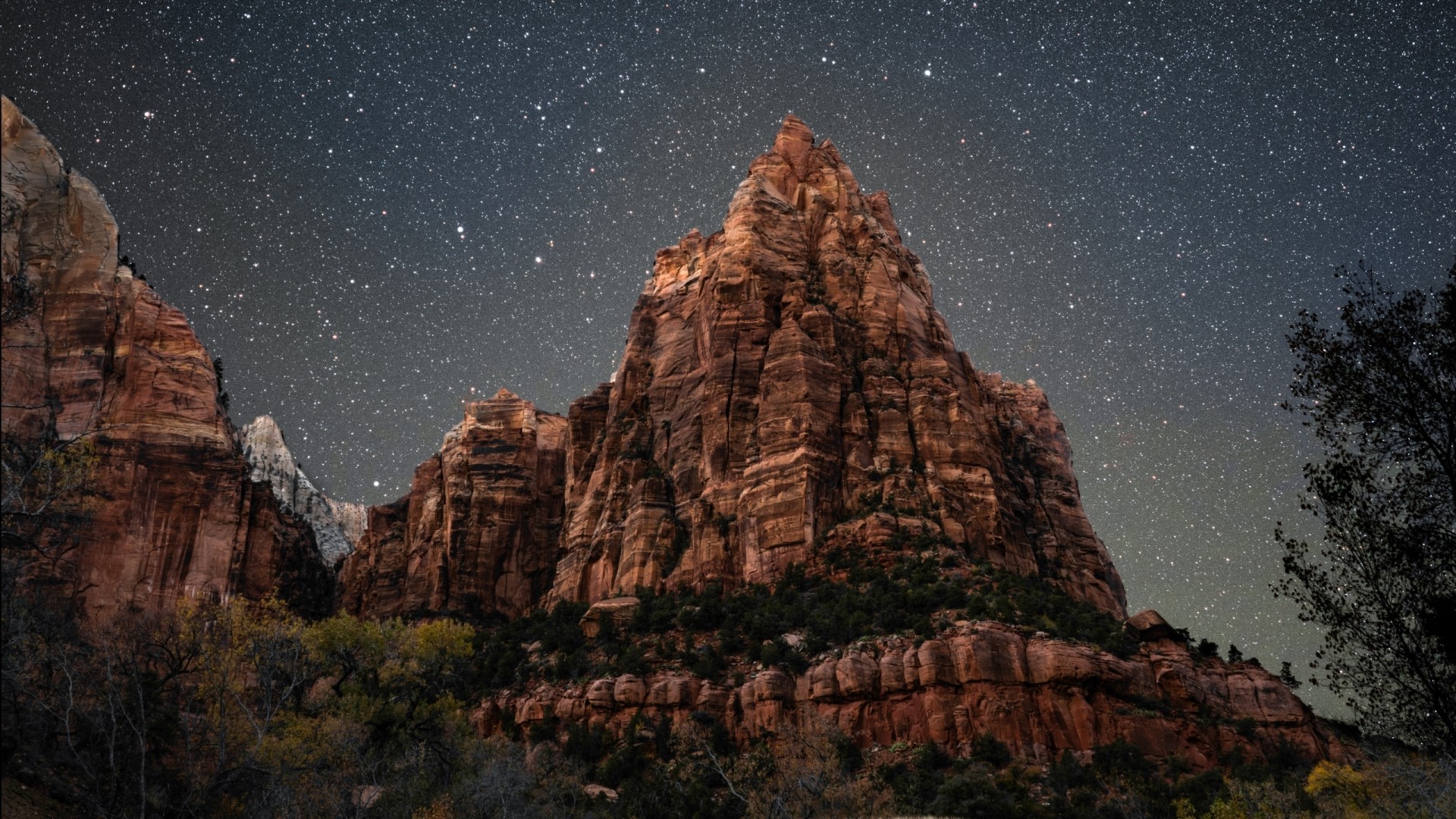 Starry sky over rocky mountains HD Wallpaper