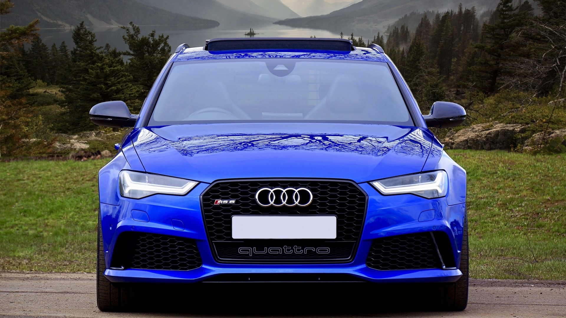 Blue Audi RS6 Avant parked outdoors HD Wallpaper
