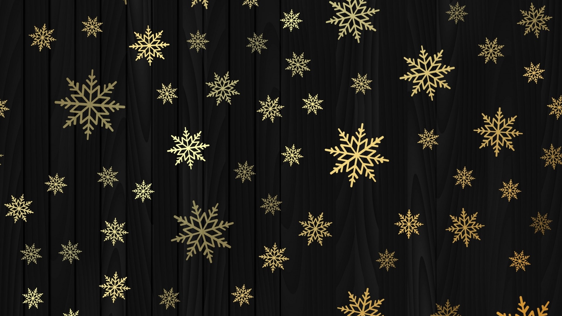Golden snowflakes on a dark wooden background HD Wallpaper