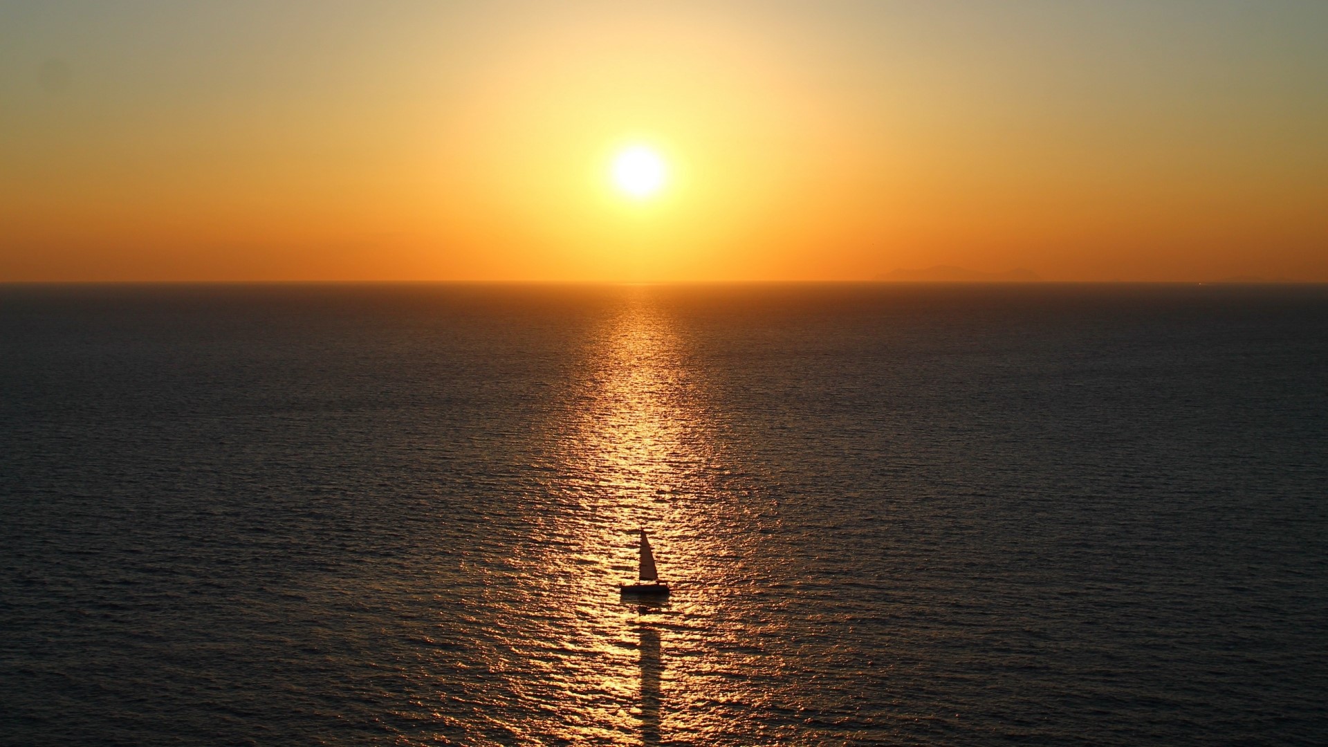 Sailboat on the ocean at sunset HD Wallpaper