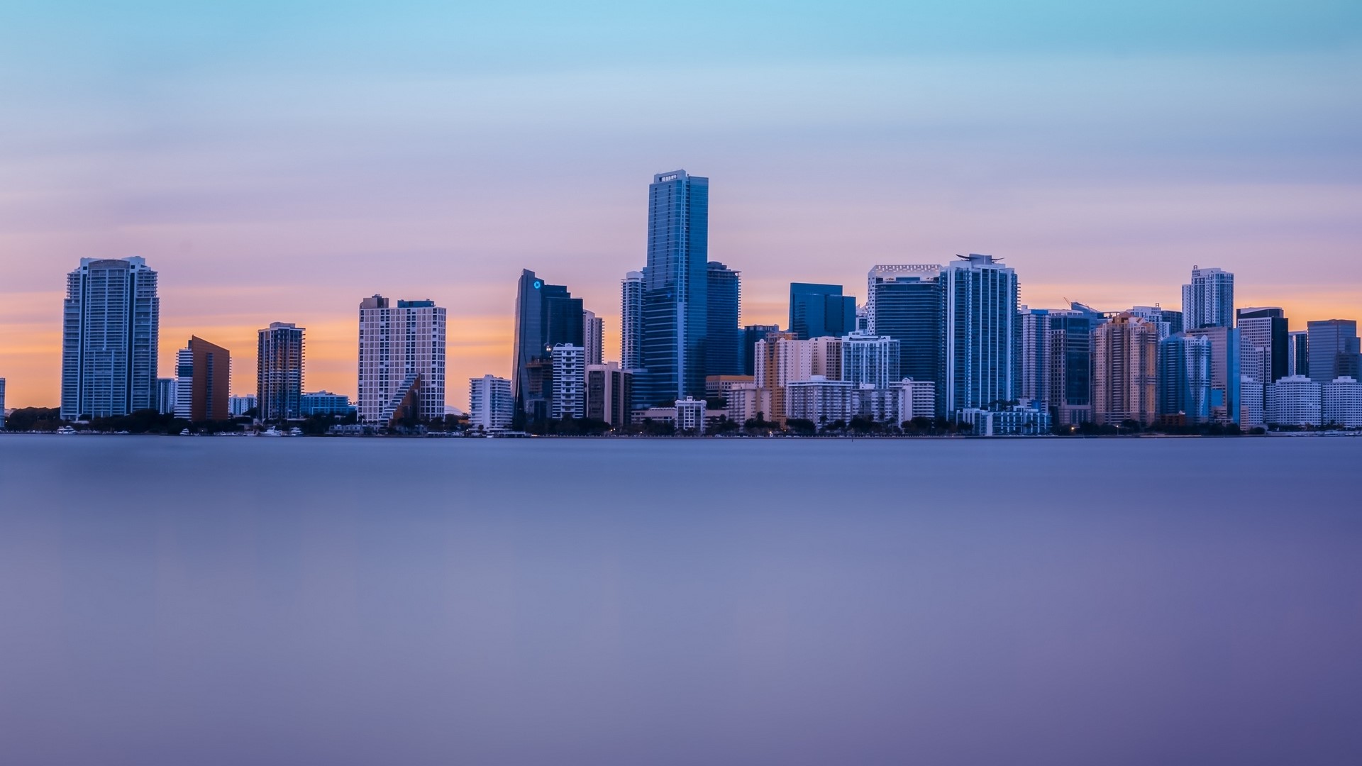 Miami skyline at dusk over the water HD Wallpaper