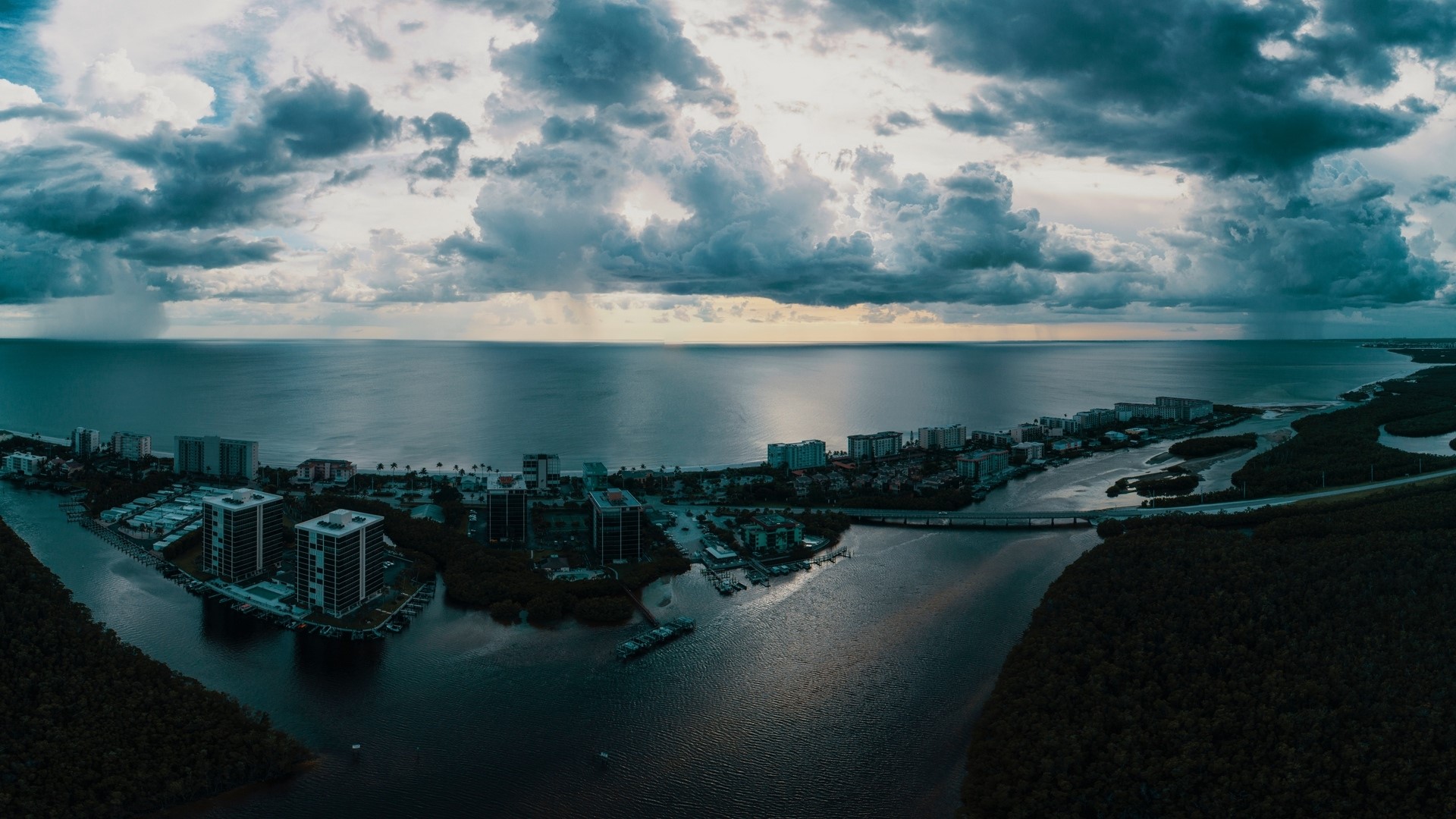 Cityscape with Ocean and Stormy Clouds HD Wallpaper