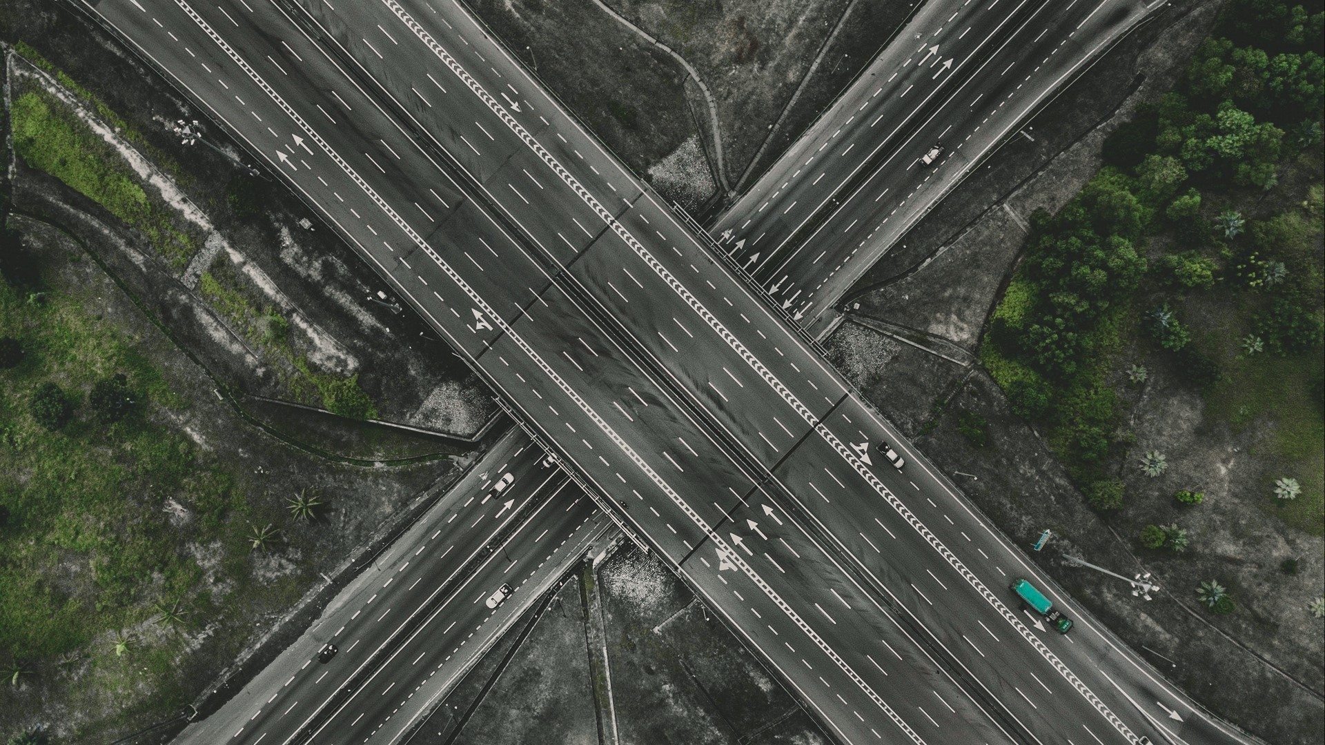Aerial view of a highway interchange HD Wallpaper