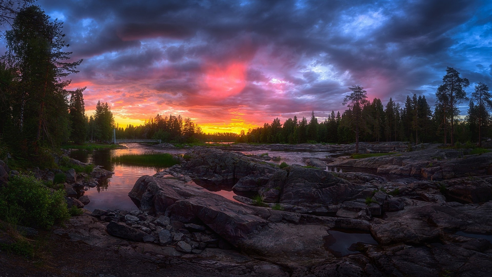 Sunset over a rocky river in a forest HD Wallpaper