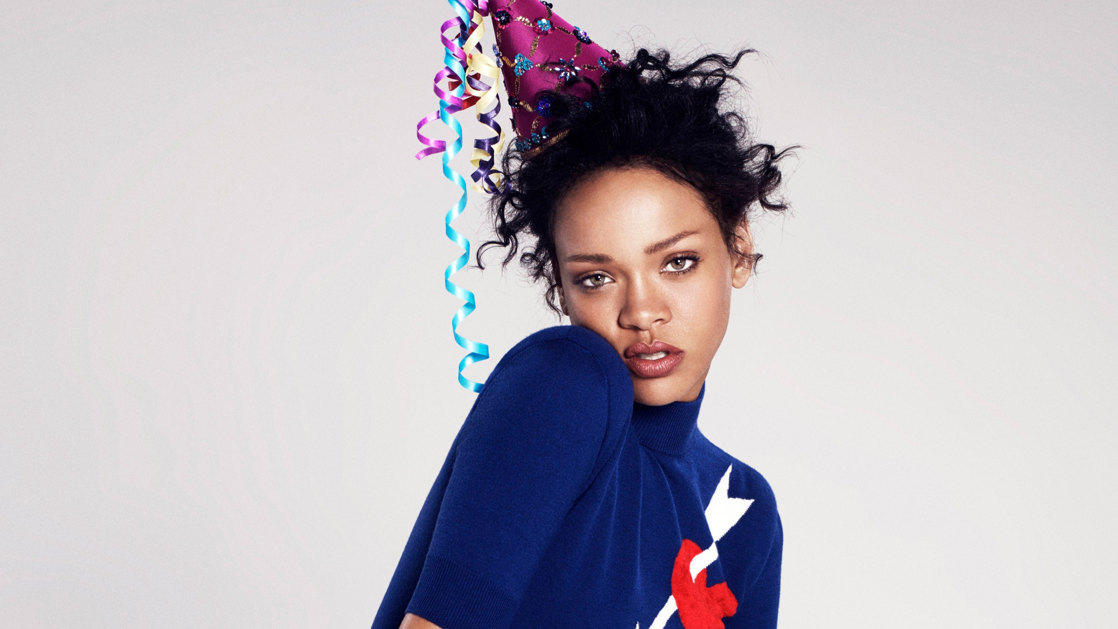Rihanna wearing a party hat HD Wallpaper