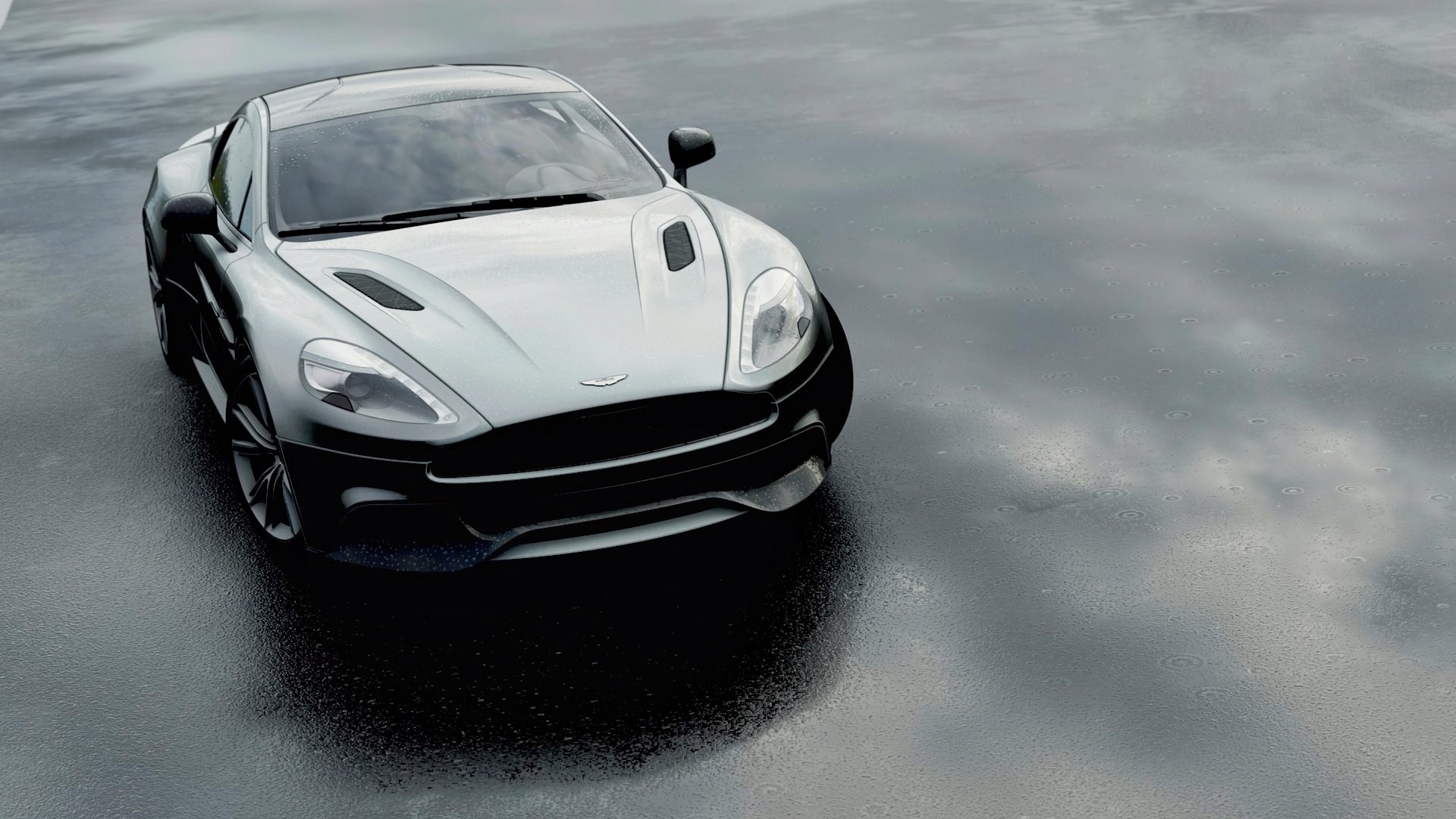 Aston Martin DBS V12 on wet asphalt HD Wallpaper