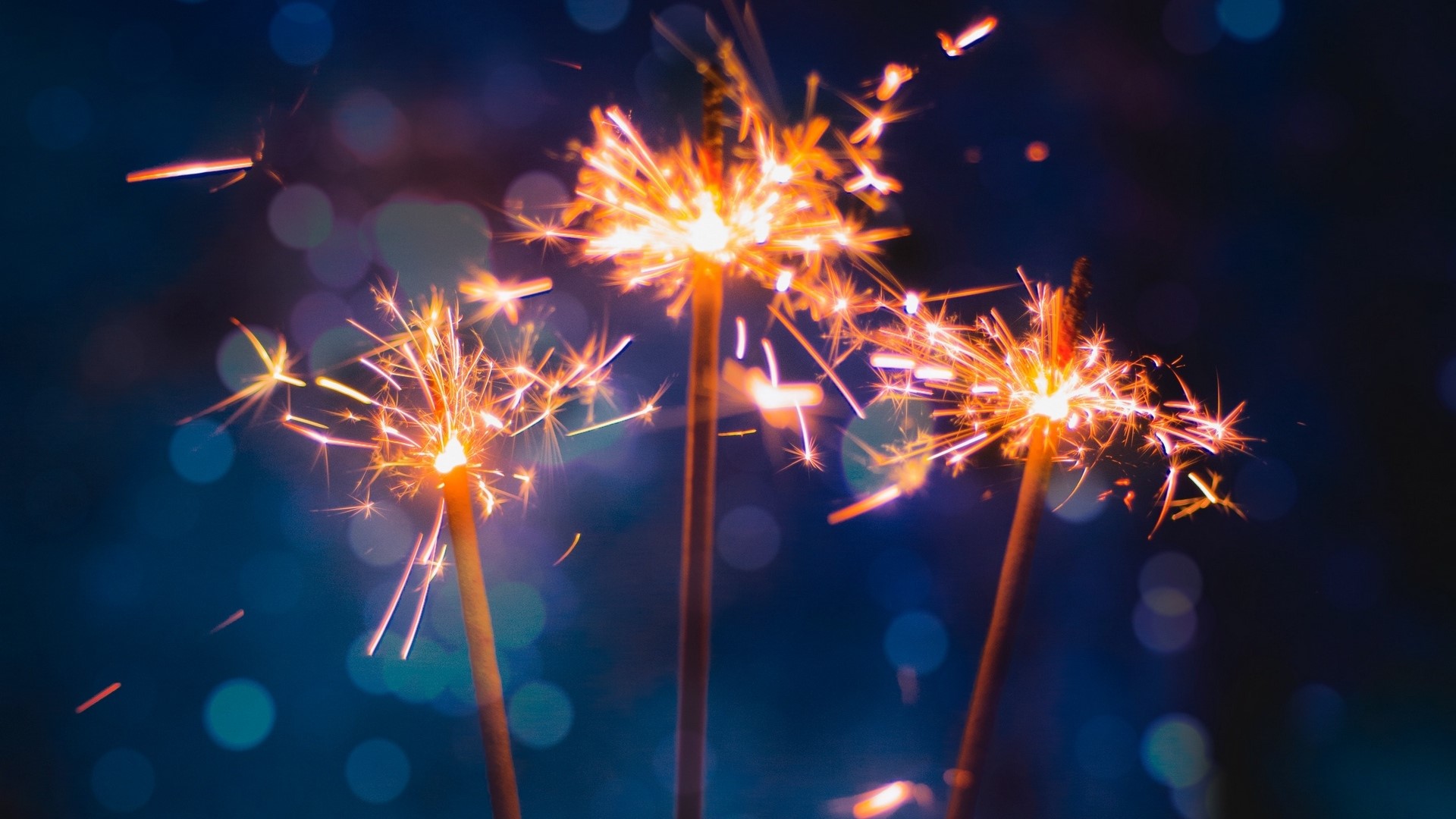 Sparklers with Bokeh Background HD Wallpaper