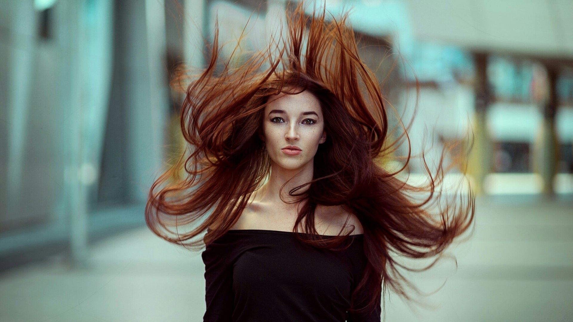 Woman with long red hair blowing in the wind HD Wallpaper