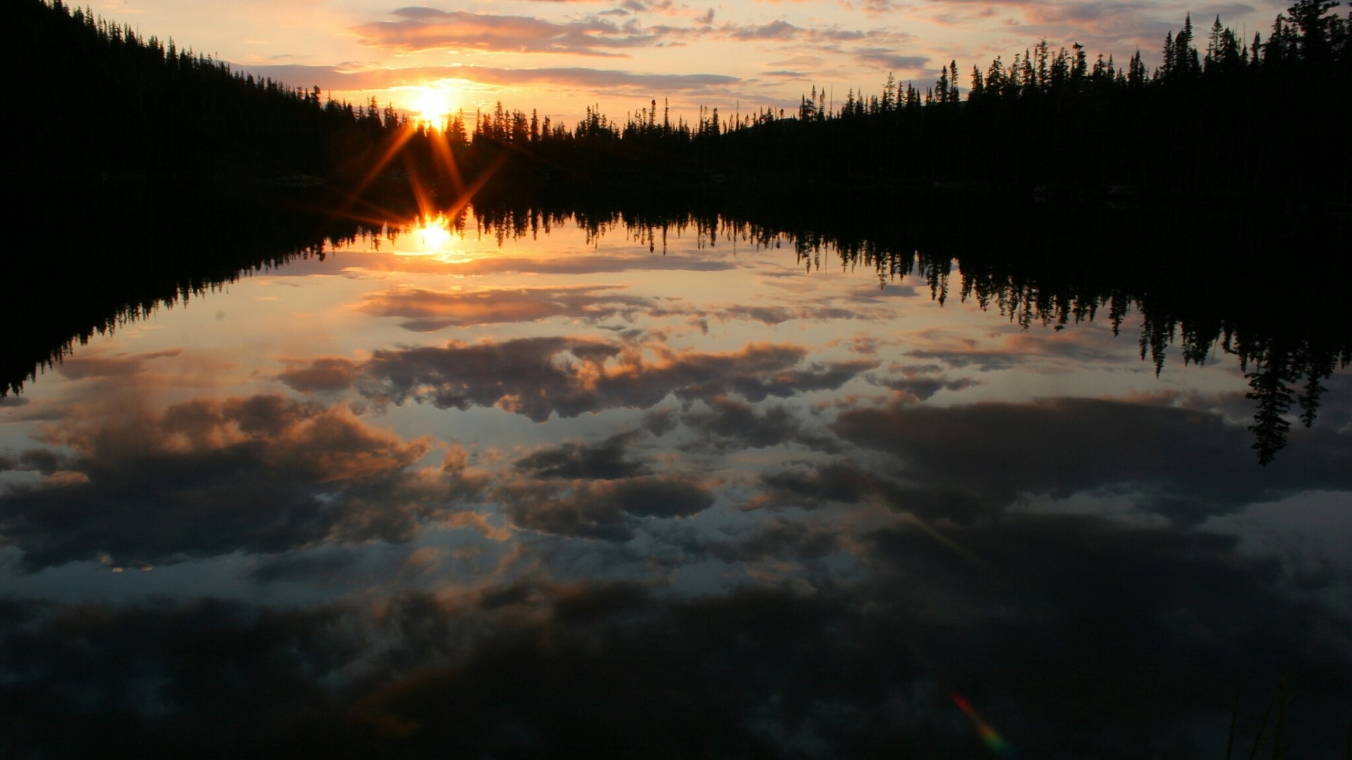 Sunset over a forest lake with reflections HD Wallpaper
