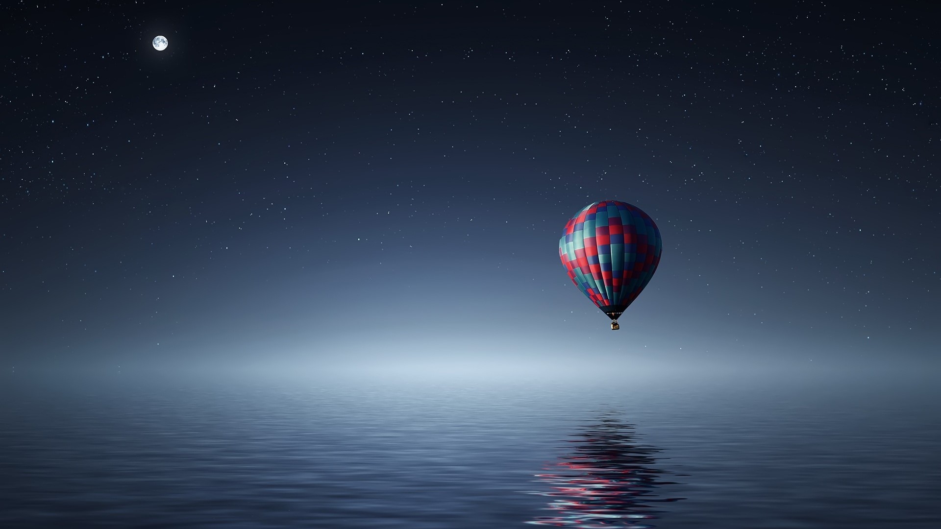 Hot air balloon over water at night HD Wallpaper