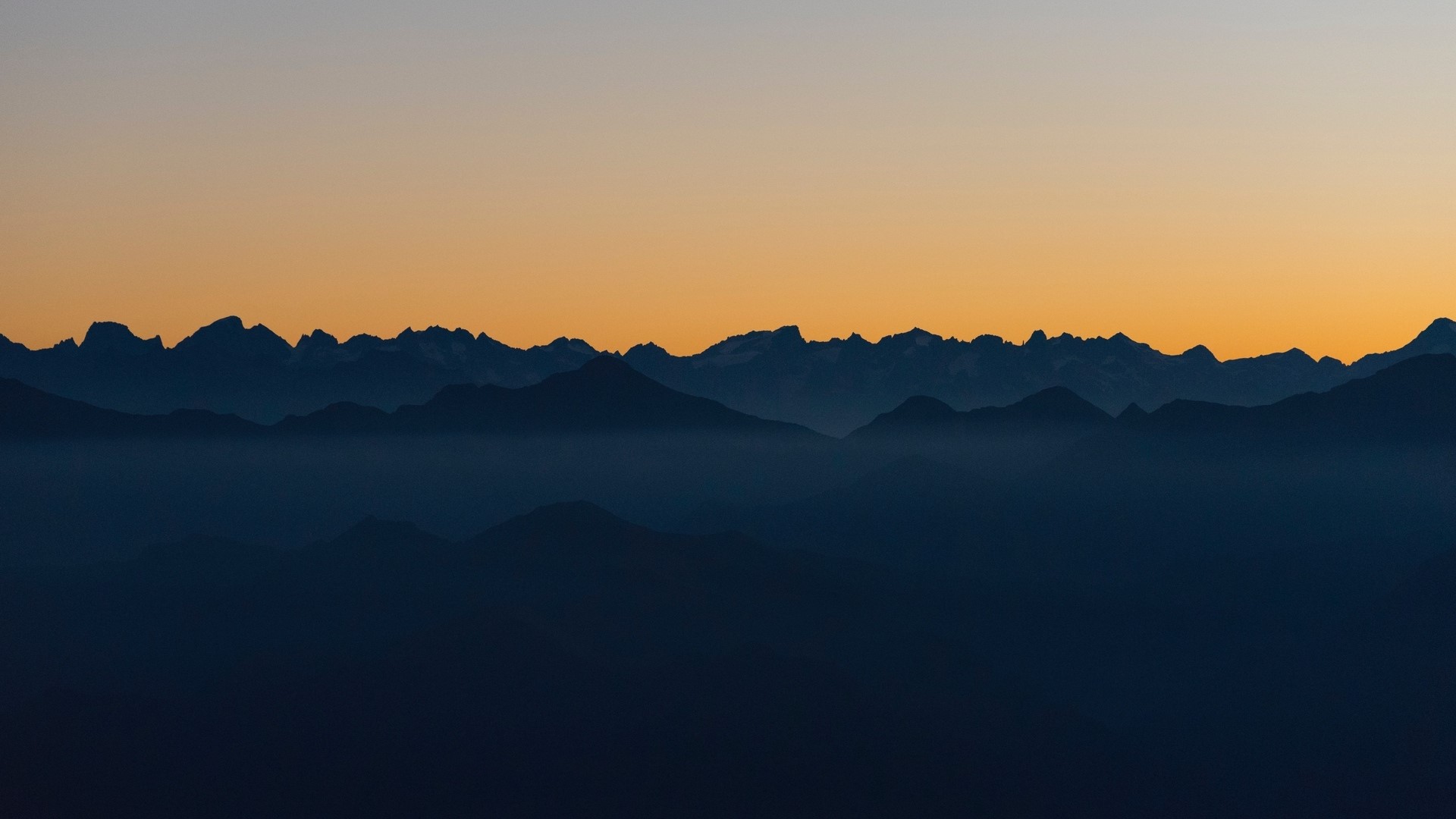 Mountain Range Silhouette at Sunset HD Wallpaper