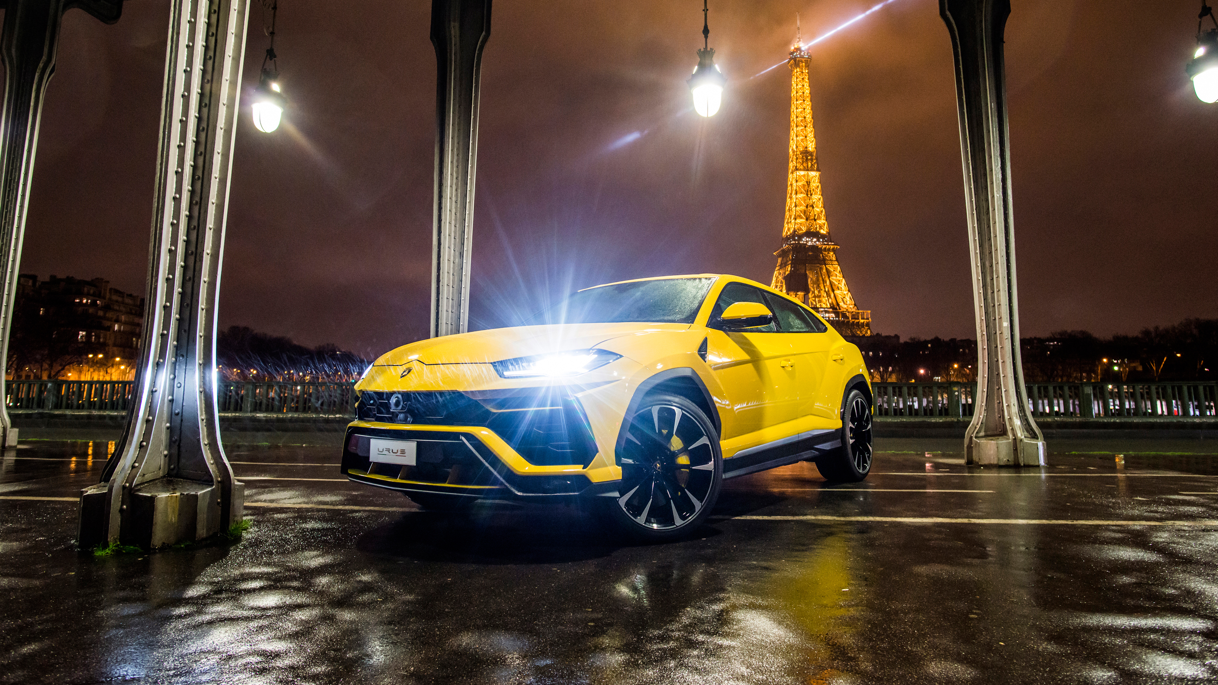 Yellow Lamborghini Urus in Paris with Eiffel Tower HD Wallpaper