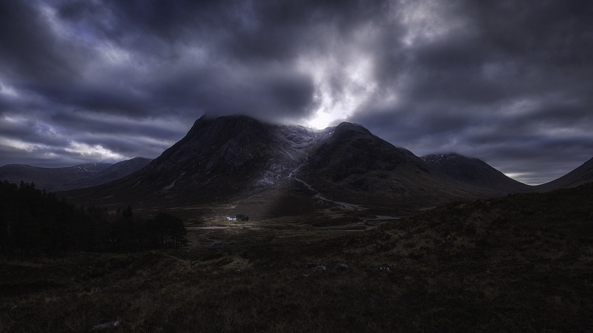 Dramatic mountain landscape in Scotland with a lone house HD Wallpaper