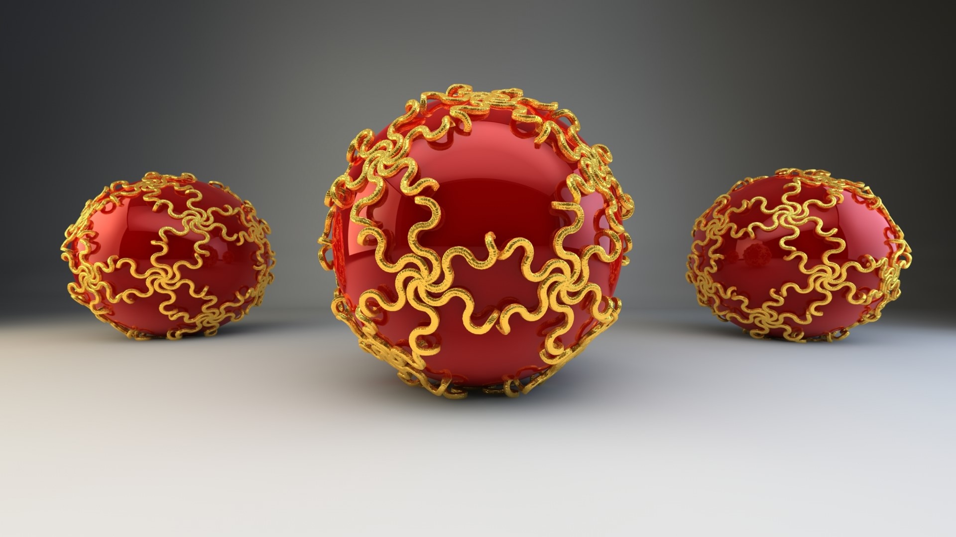 Three red spheres with gold ornate patterns HD Wallpaper