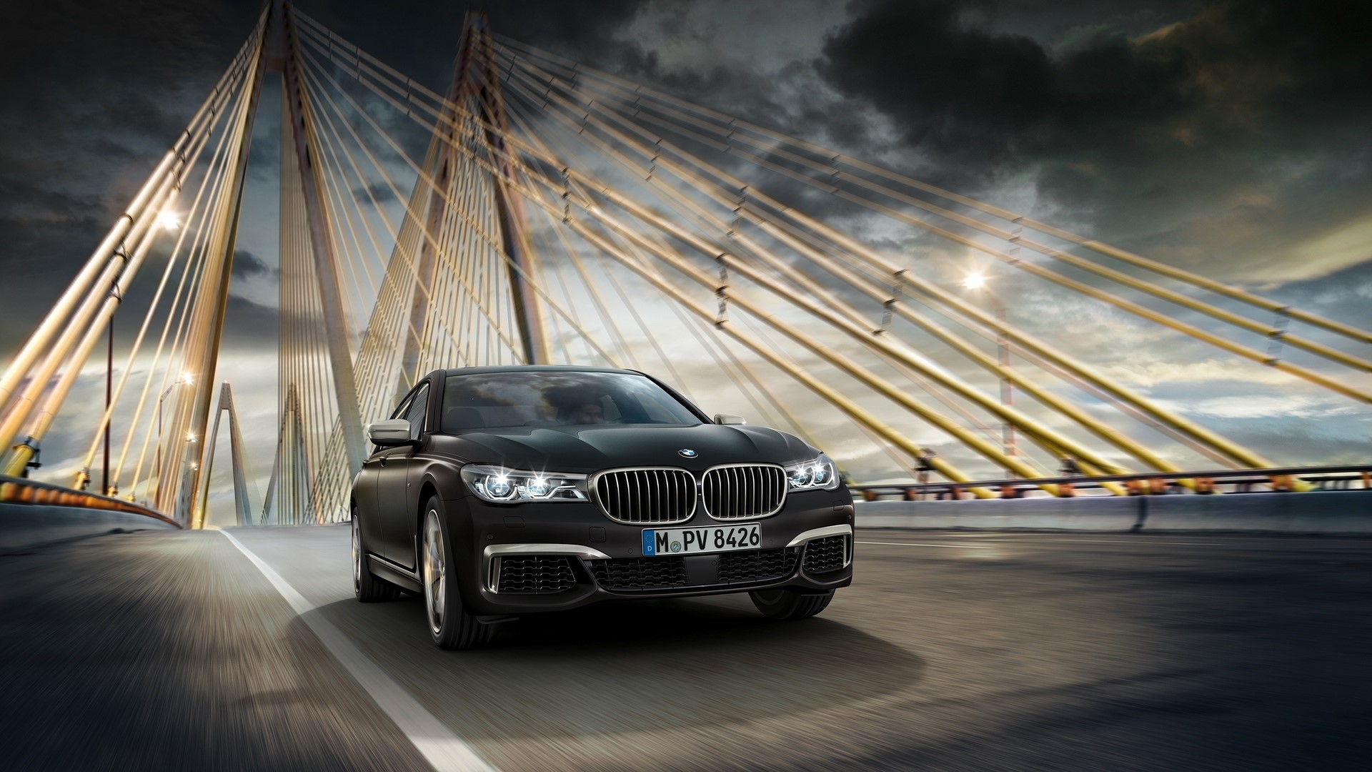 Black BMW driving on a bridge HD Wallpaper