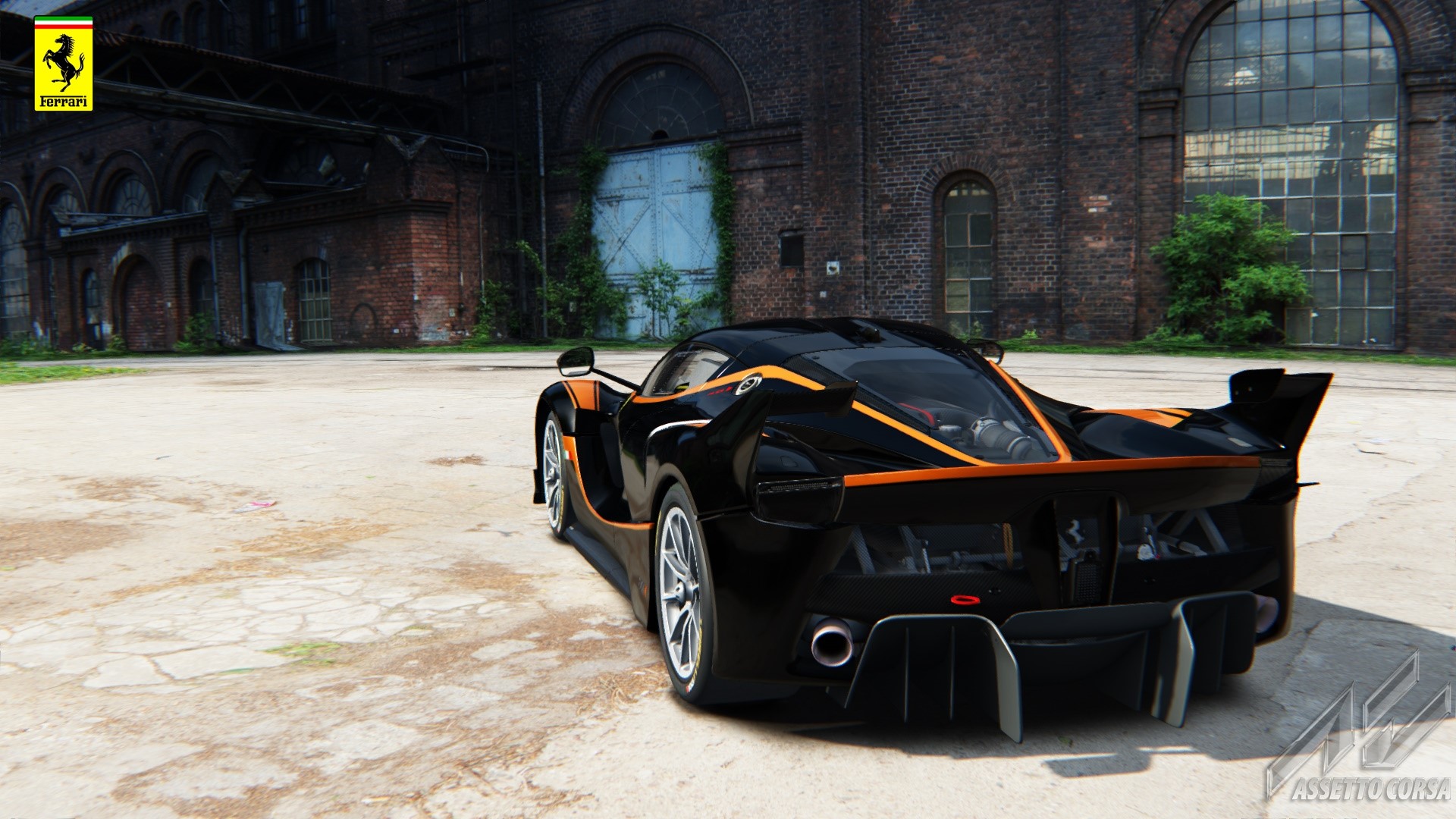 Ferrari FXX K in front of an old brick building HD Wallpaper