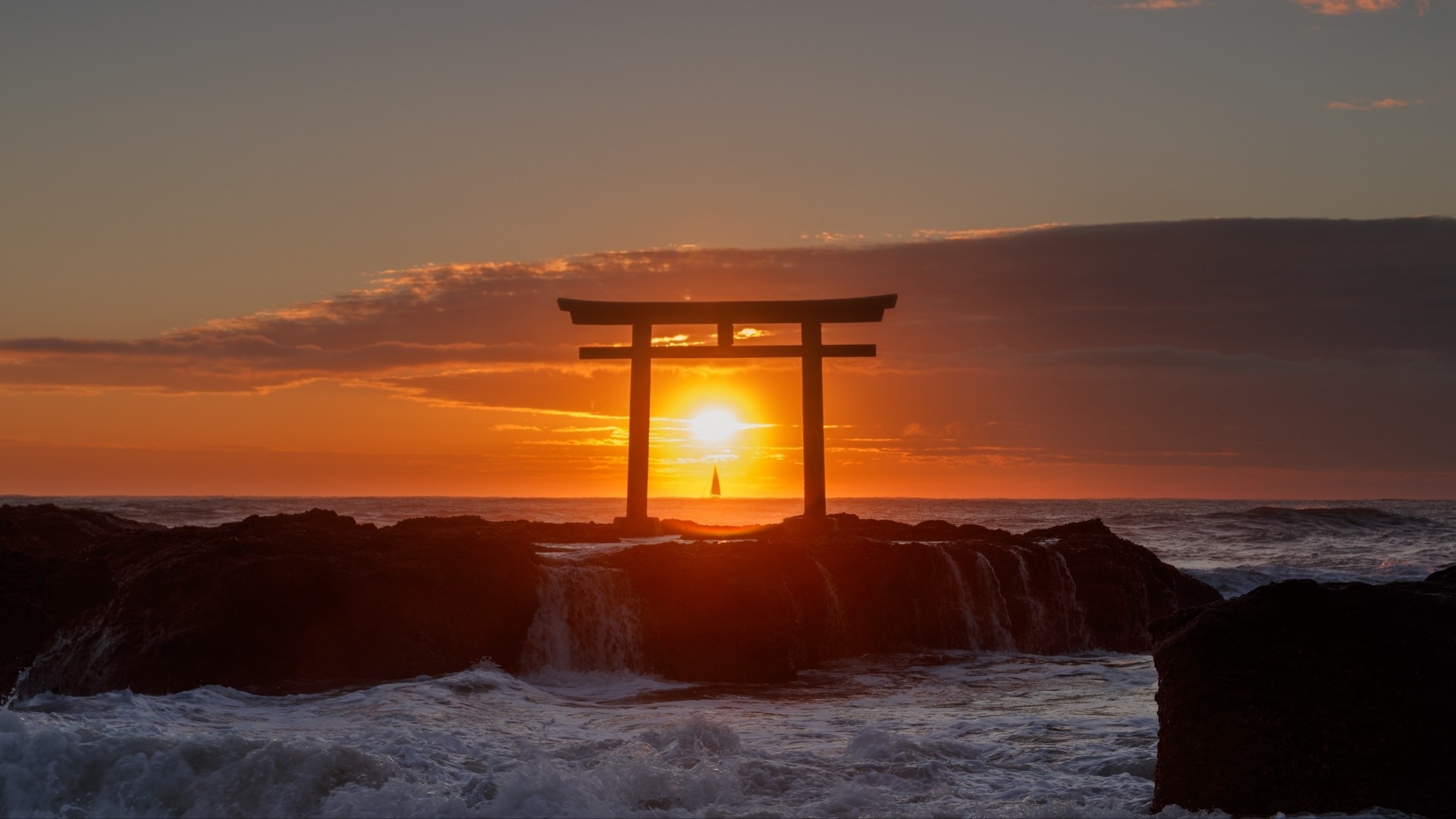 Torii gate at sunset over the ocean HD Wallpaper