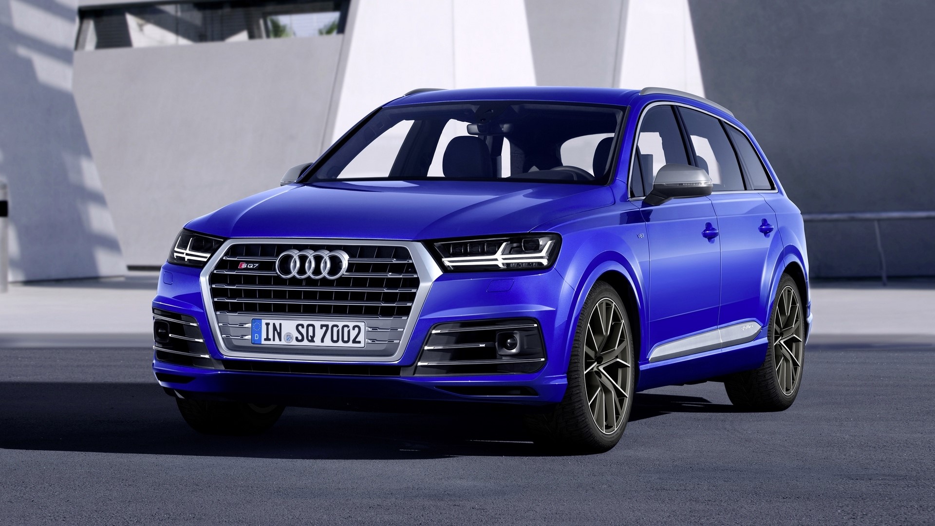 Blue Audi SQ7 TDI parked outdoors HD Wallpaper