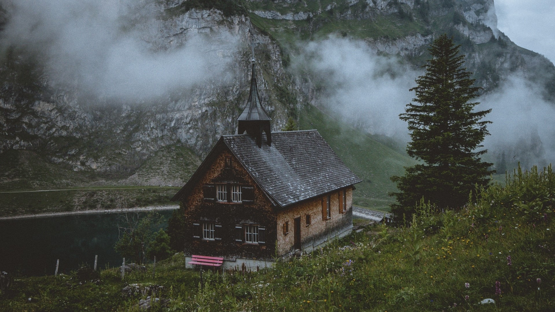 Wooden cabin by a lake in the Swiss Alps HD Wallpaper