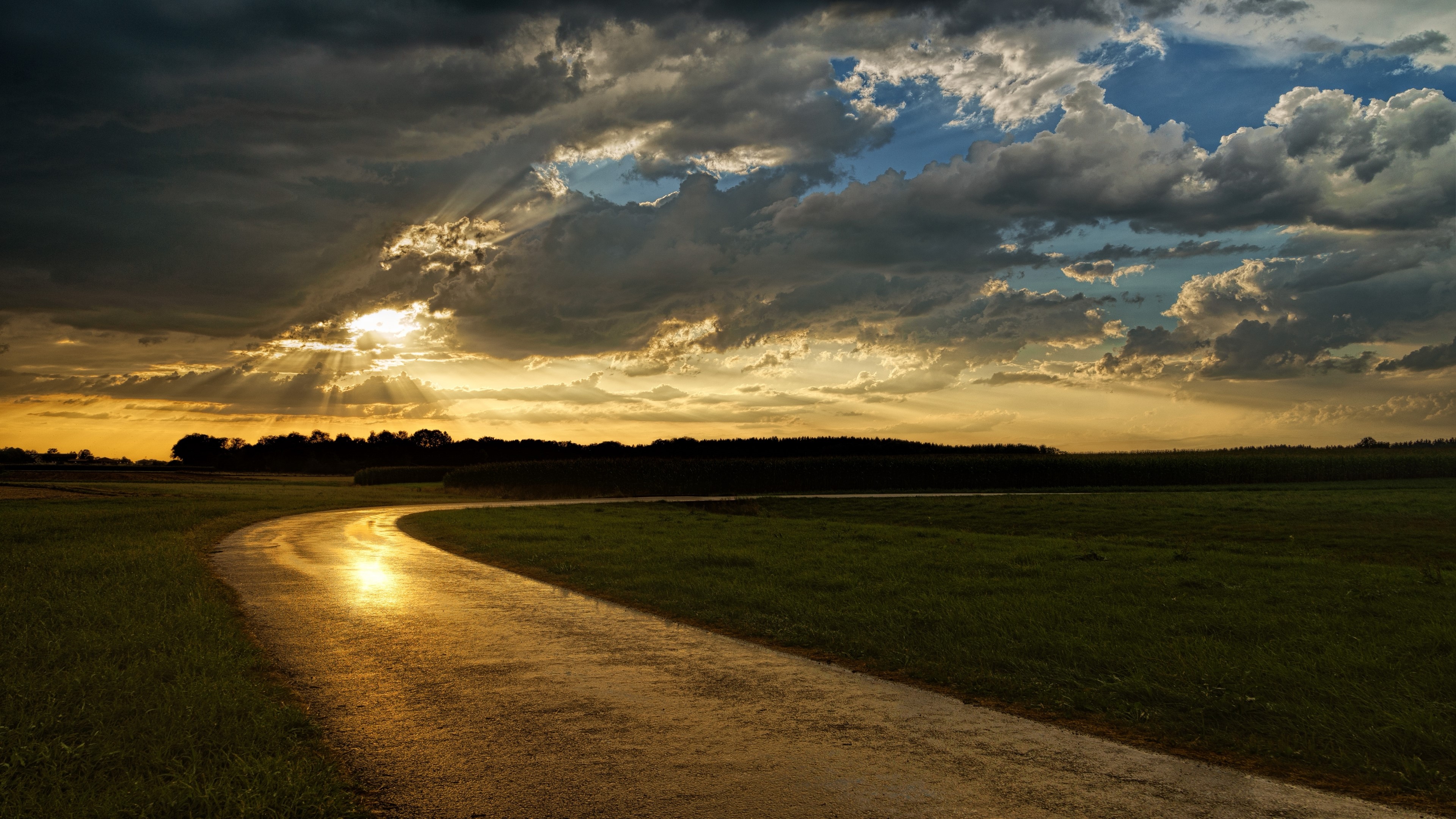 4K Sunset Over a Winding Road HD Wallpaper