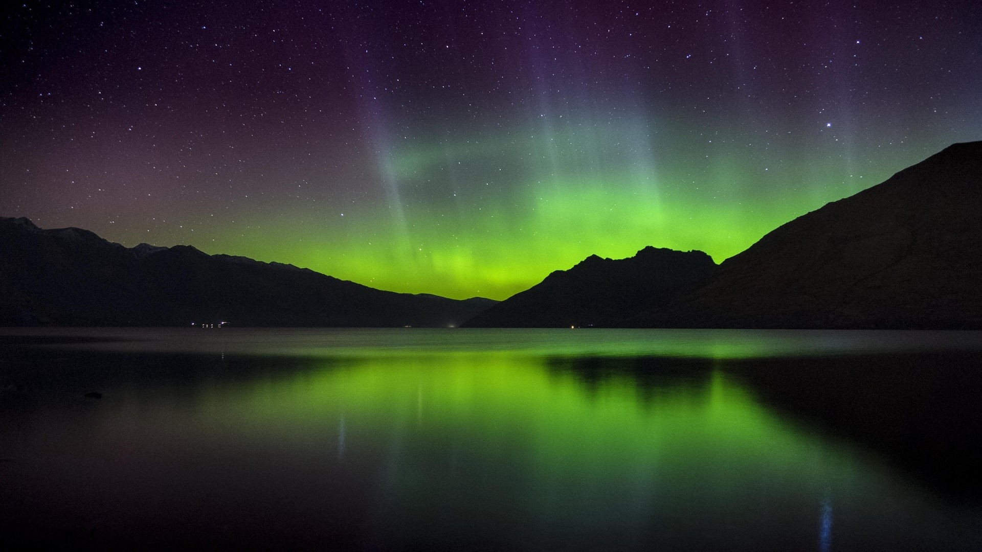Northern Lights over a Lake and Mountains HD Wallpaper