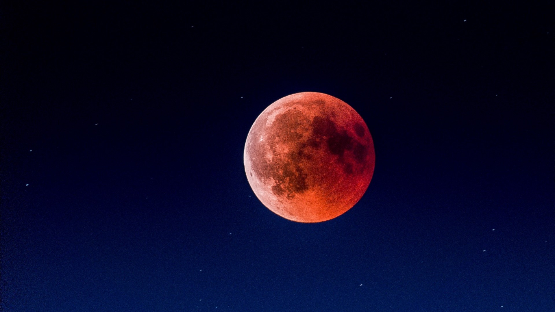 Red Moon in a Starry Night Sky HD Wallpaper