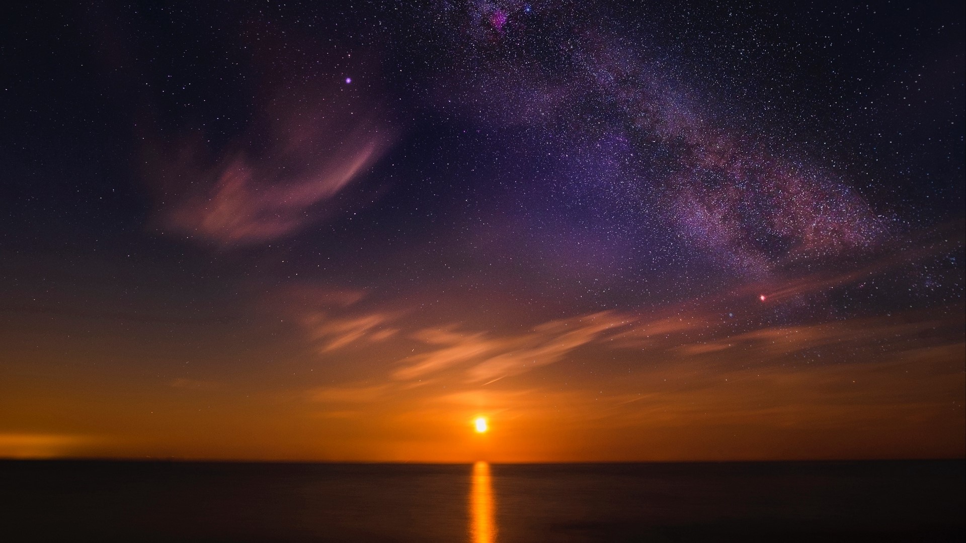 Starry sky over the ocean at sunset HD Wallpaper