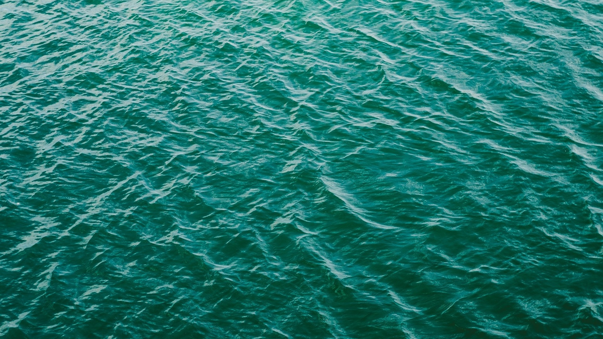 Rippling Teal Water Surface HD Wallpaper