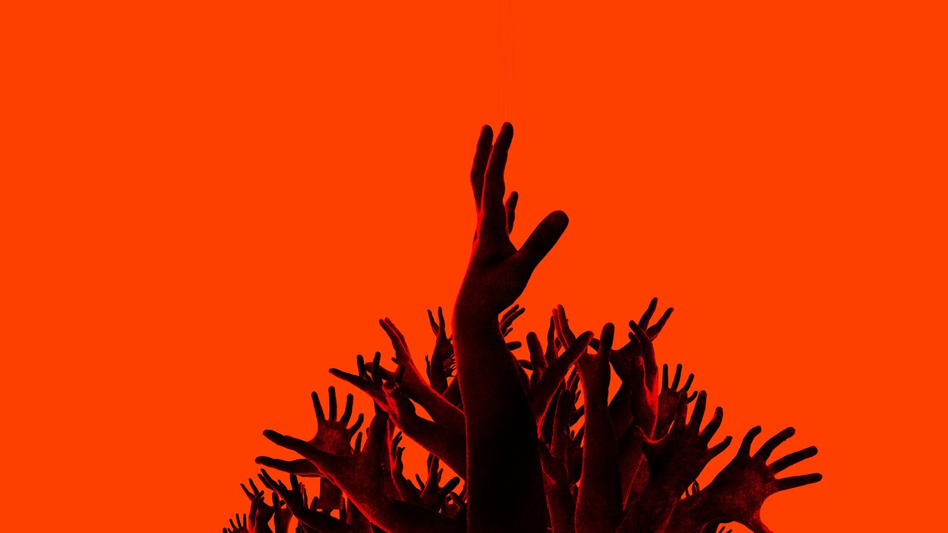 Many hands reaching up against an orange background HD Wallpaper